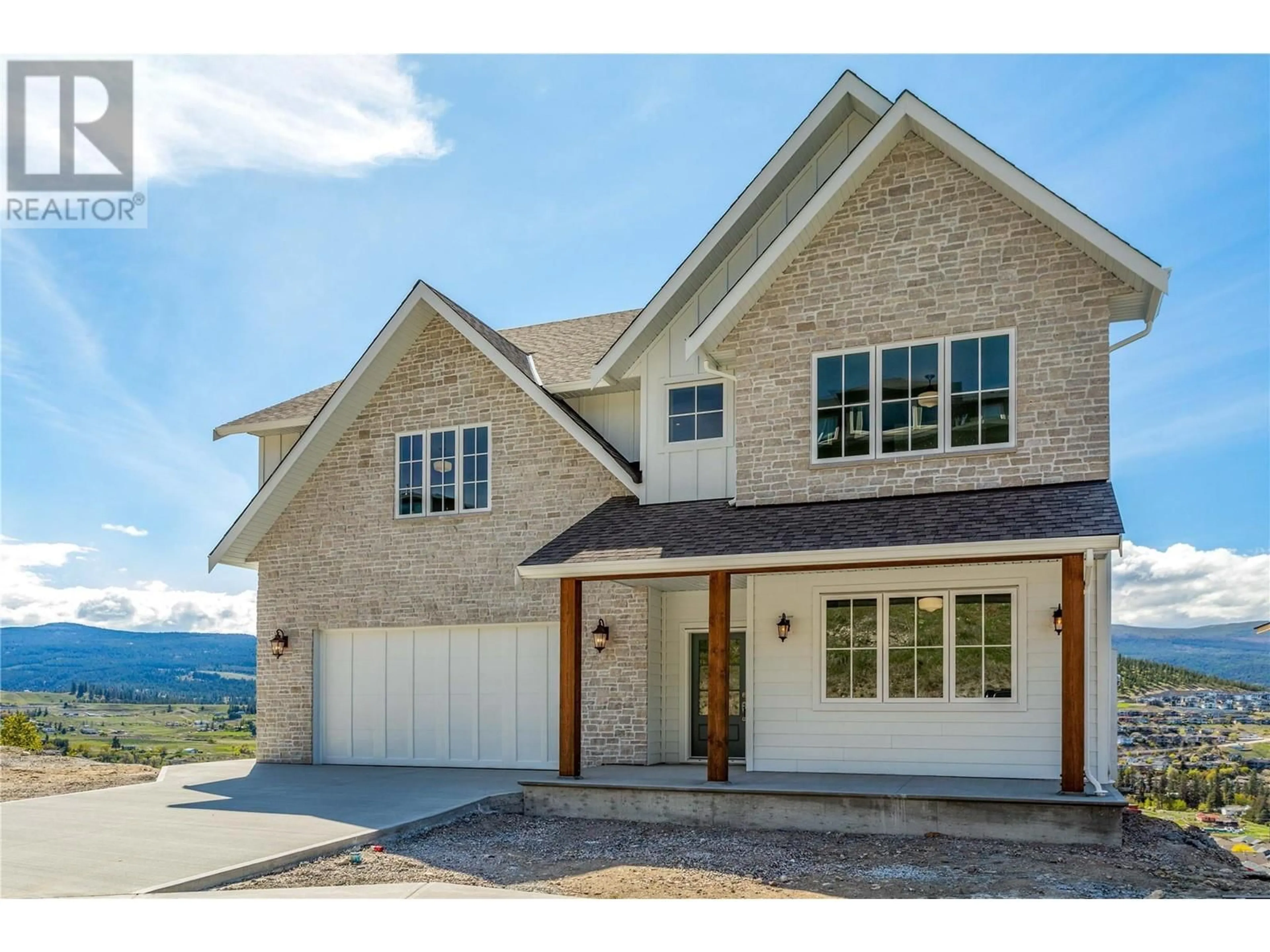 Home with brick exterior material, mountain view for 1561 FAIRWOOD LANE, Kelowna British Columbia V1P1L7