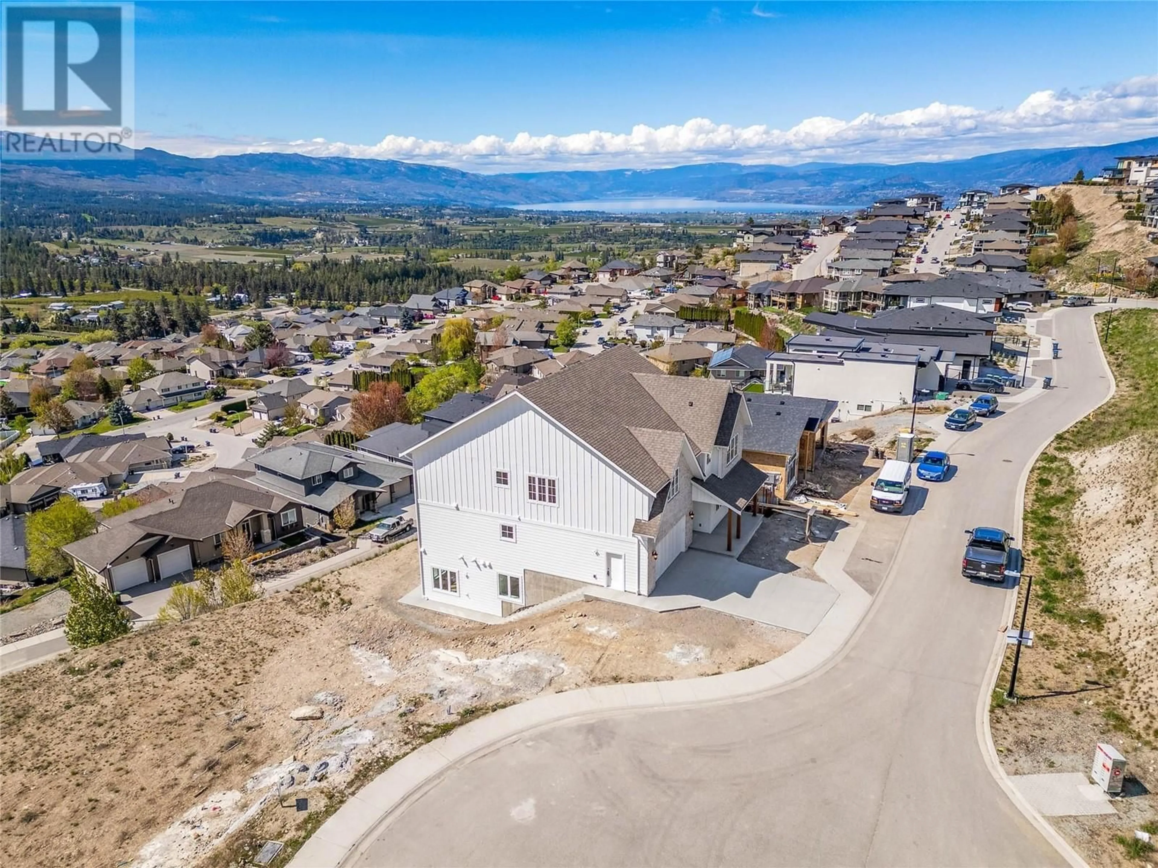 A pic from outside/outdoor area/front of a property/back of a property/a pic from drone, mountain view for 1561 Fairwood Lane, Kelowna British Columbia V1P1L7