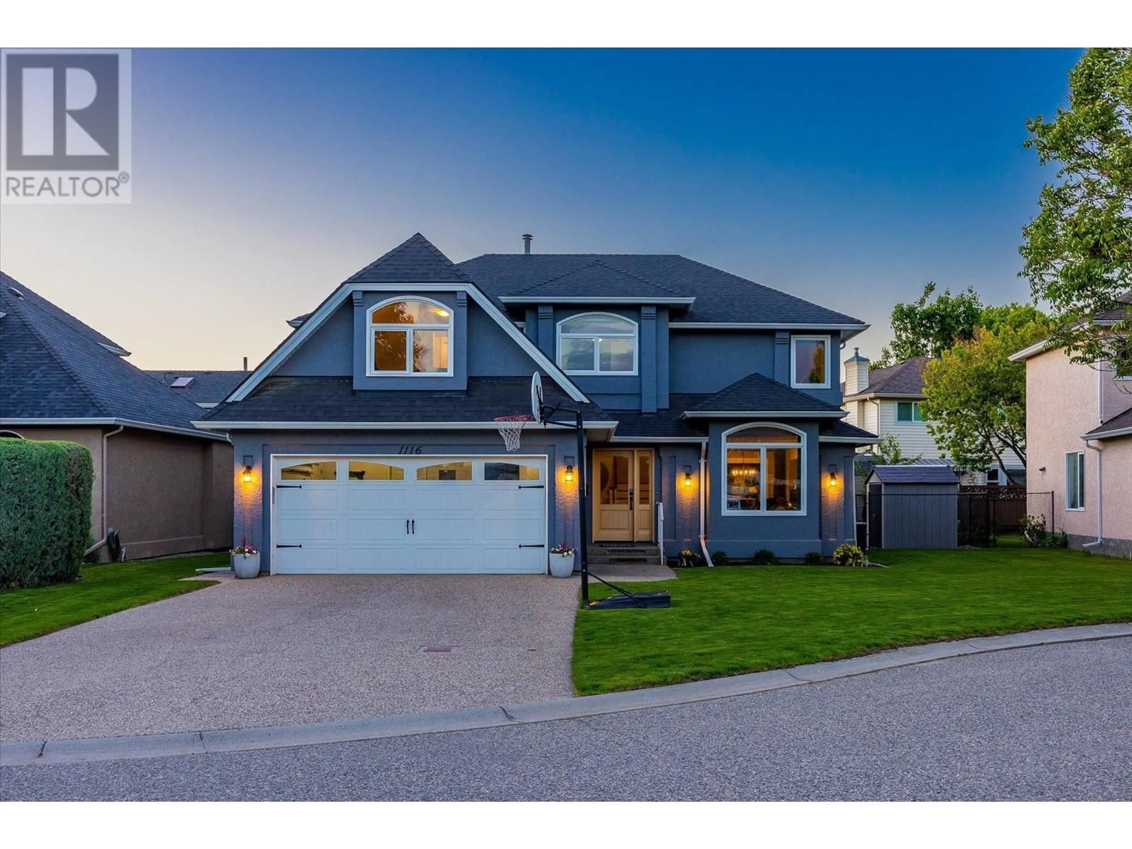 Home with vinyl exterior material, street for 1116 Windermere Court, Kelowna British Columbia V1W3R6