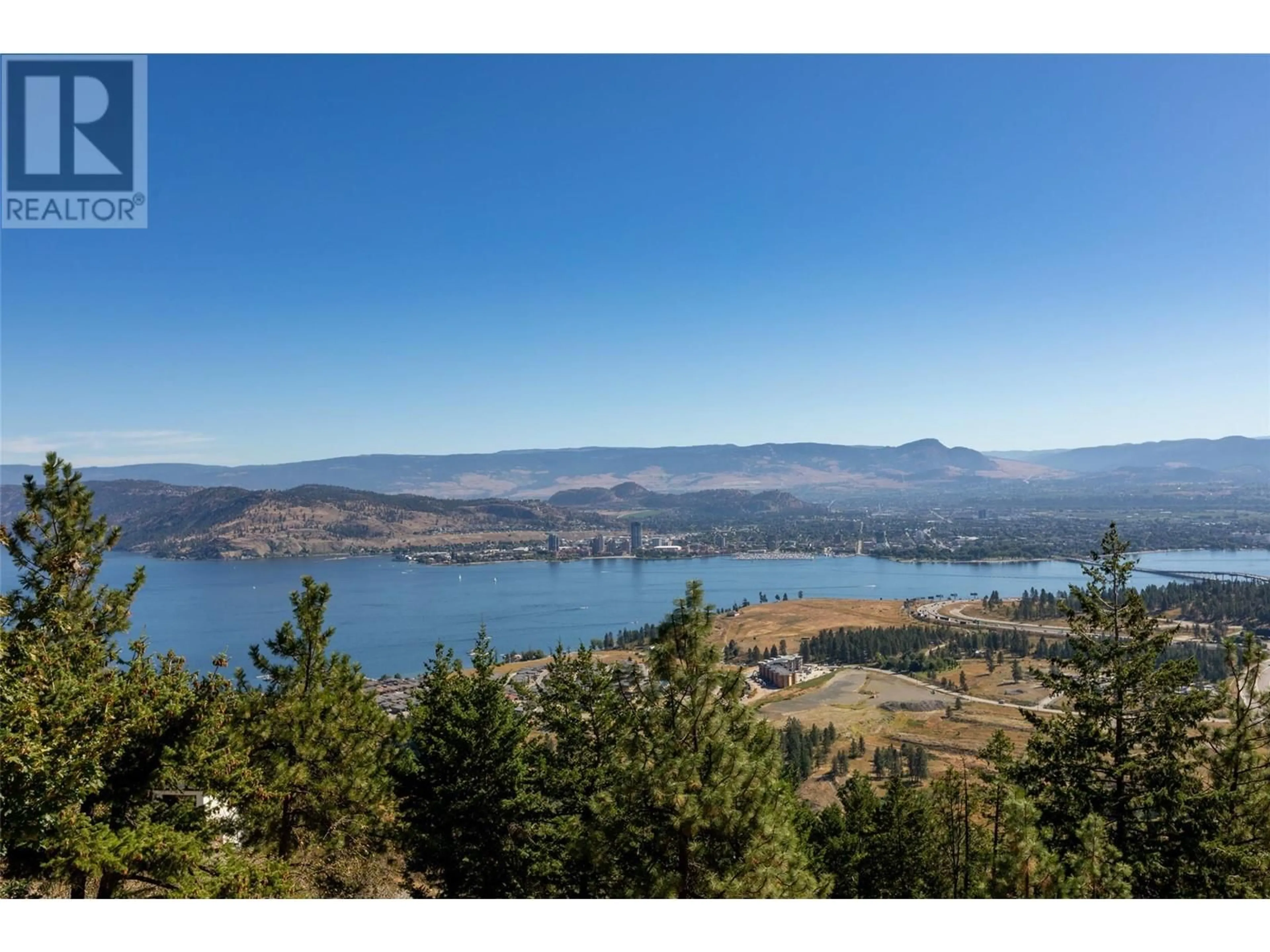 A pic from outside/outdoor area/front of a property/back of a property/a pic from drone, water/lake/river/ocean view for 1768 Keloka Drive, West Kelowna British Columbia V1Z2X1