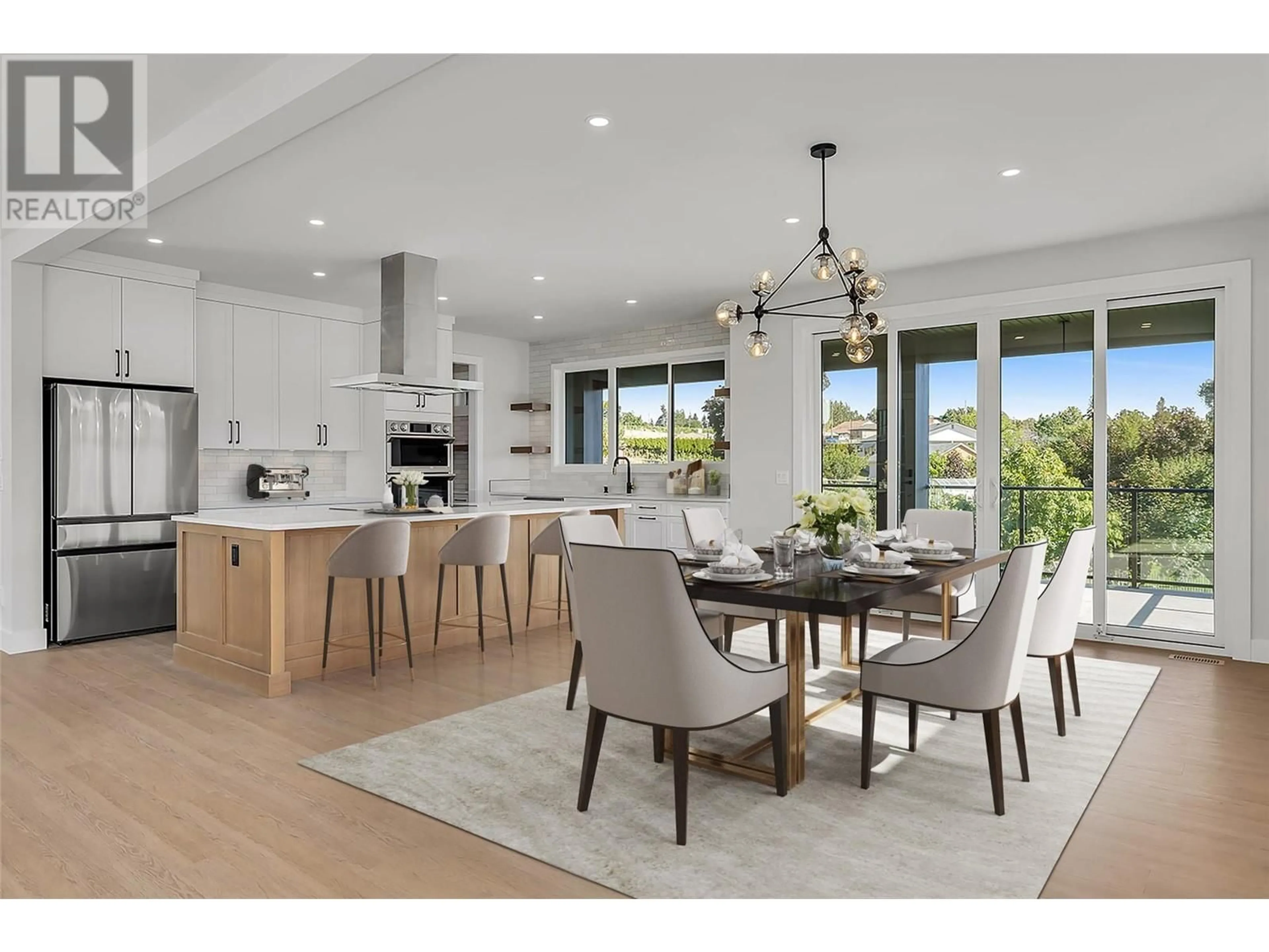 Open concept kitchen, wood/laminate floor for 1054 OAK BARREL PLACE, West Kelowna British Columbia V1Z0A6