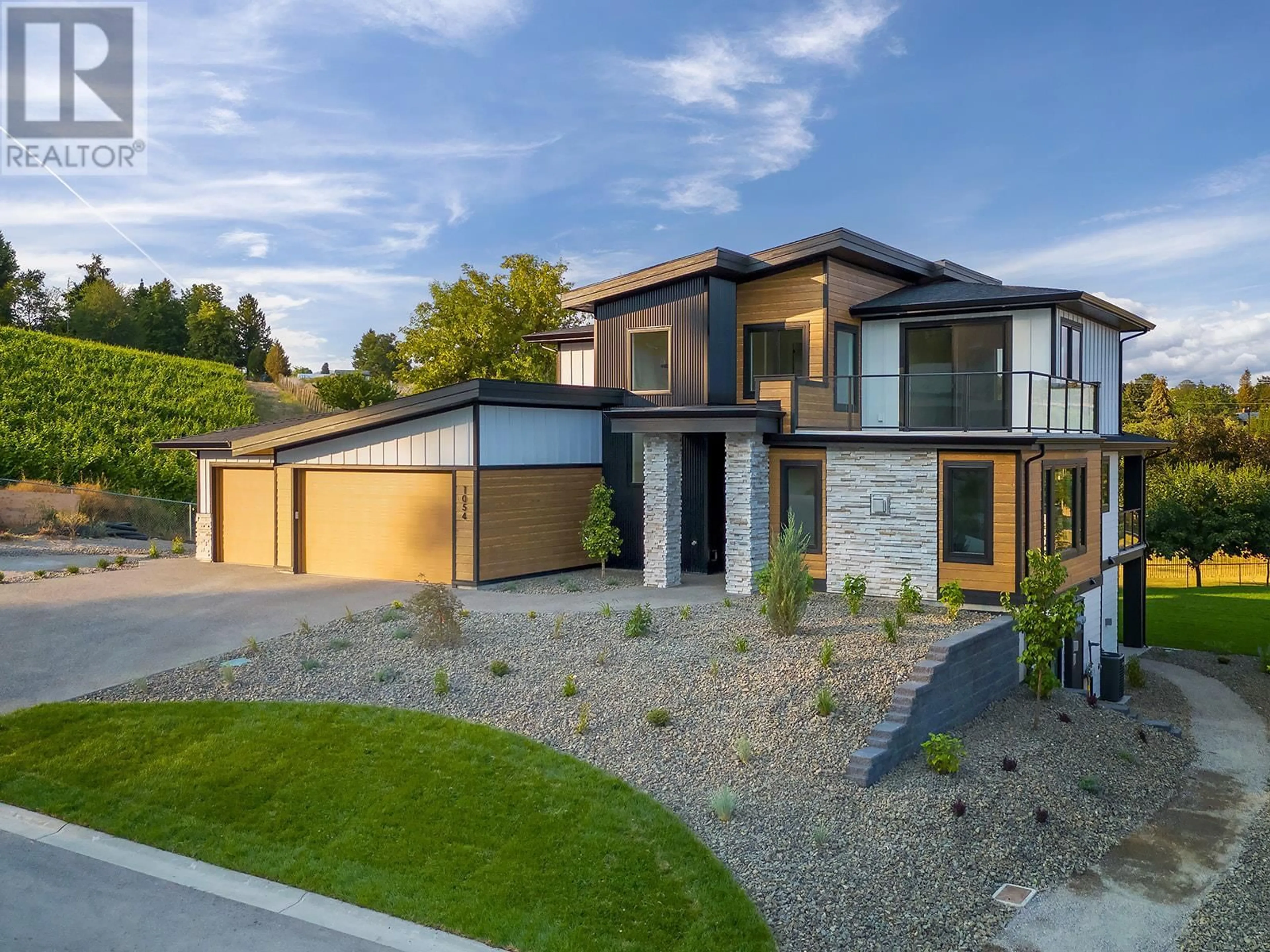 Home with brick exterior material, street for 1054 Oak Barrel Place, West Kelowna British Columbia V1Z0A6