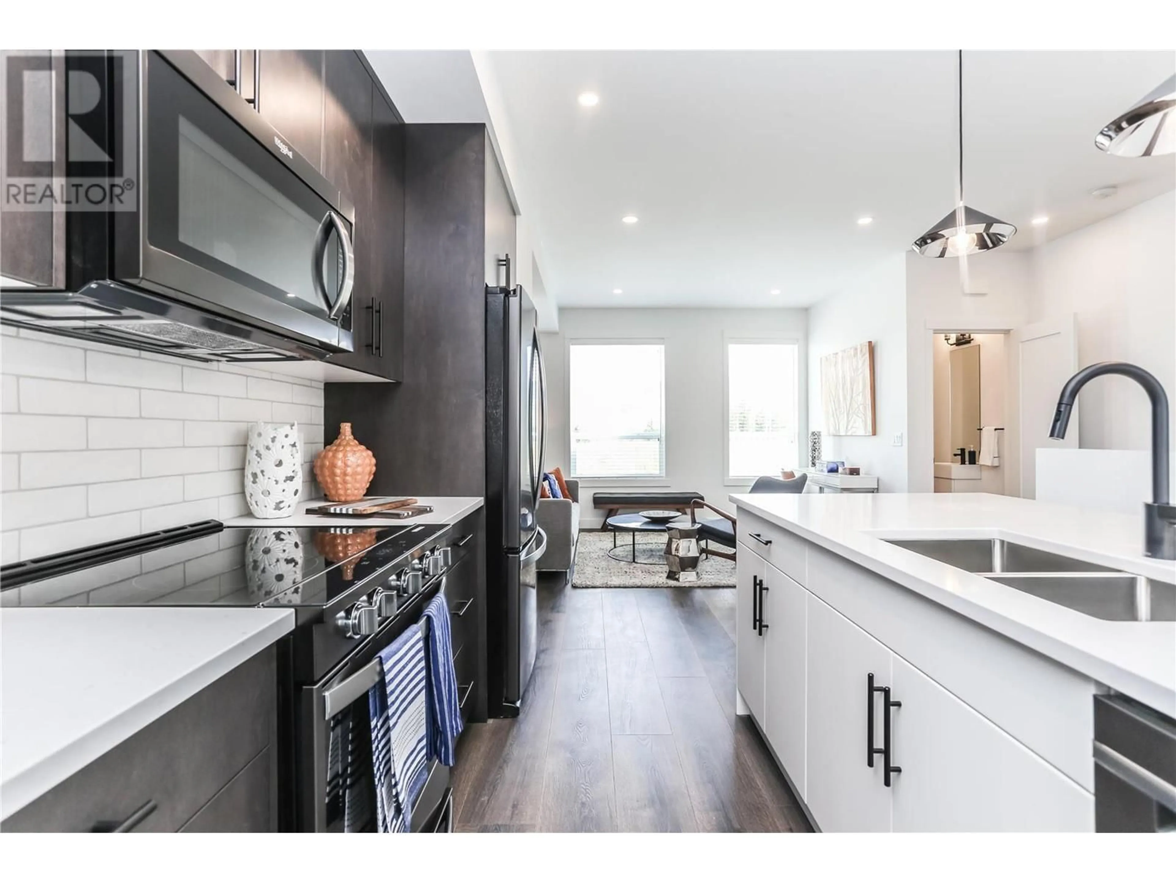 Open concept kitchen, ceramic/tile floor for 610 Academy Way Unit# 26, Kelowna British Columbia V1V0E8