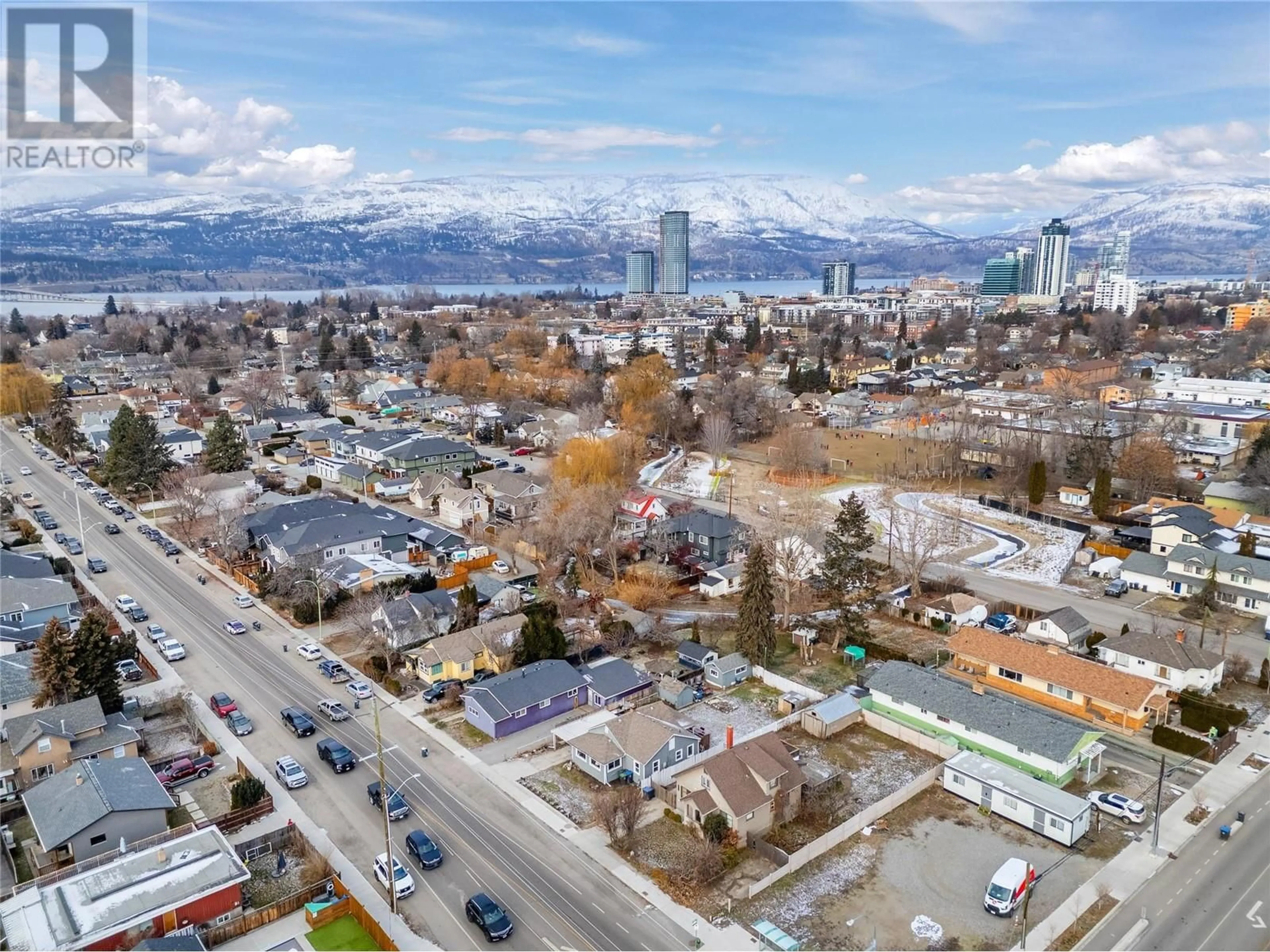 A pic from outside/outdoor area/front of a property/back of a property/a pic from drone, mountain view for 878 Cadder Avenue, Kelowna British Columbia V1Y5N6