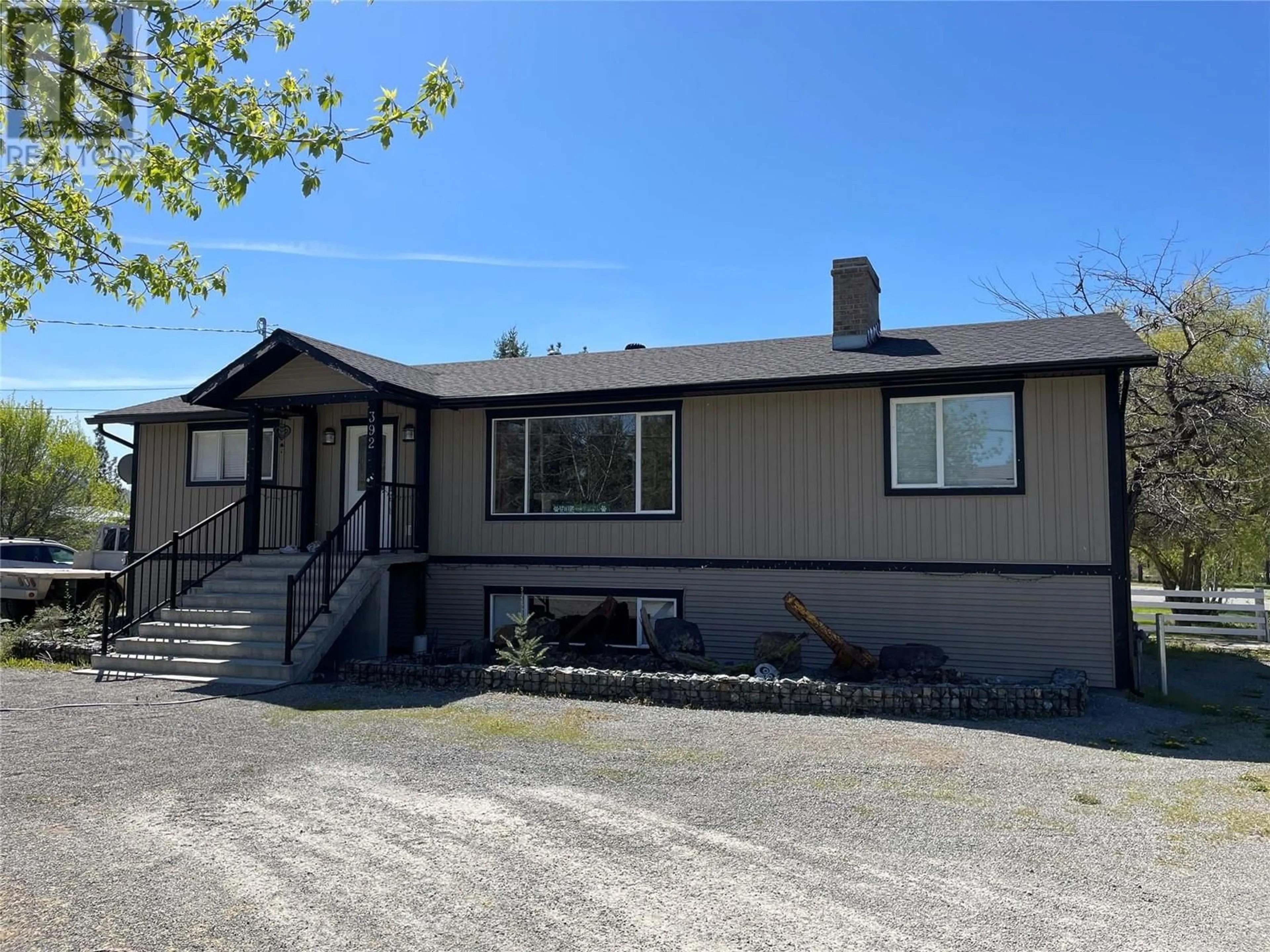 Home with vinyl exterior material, street for 392 WINNEY Avenue, Merritt British Columbia V0K1Y0