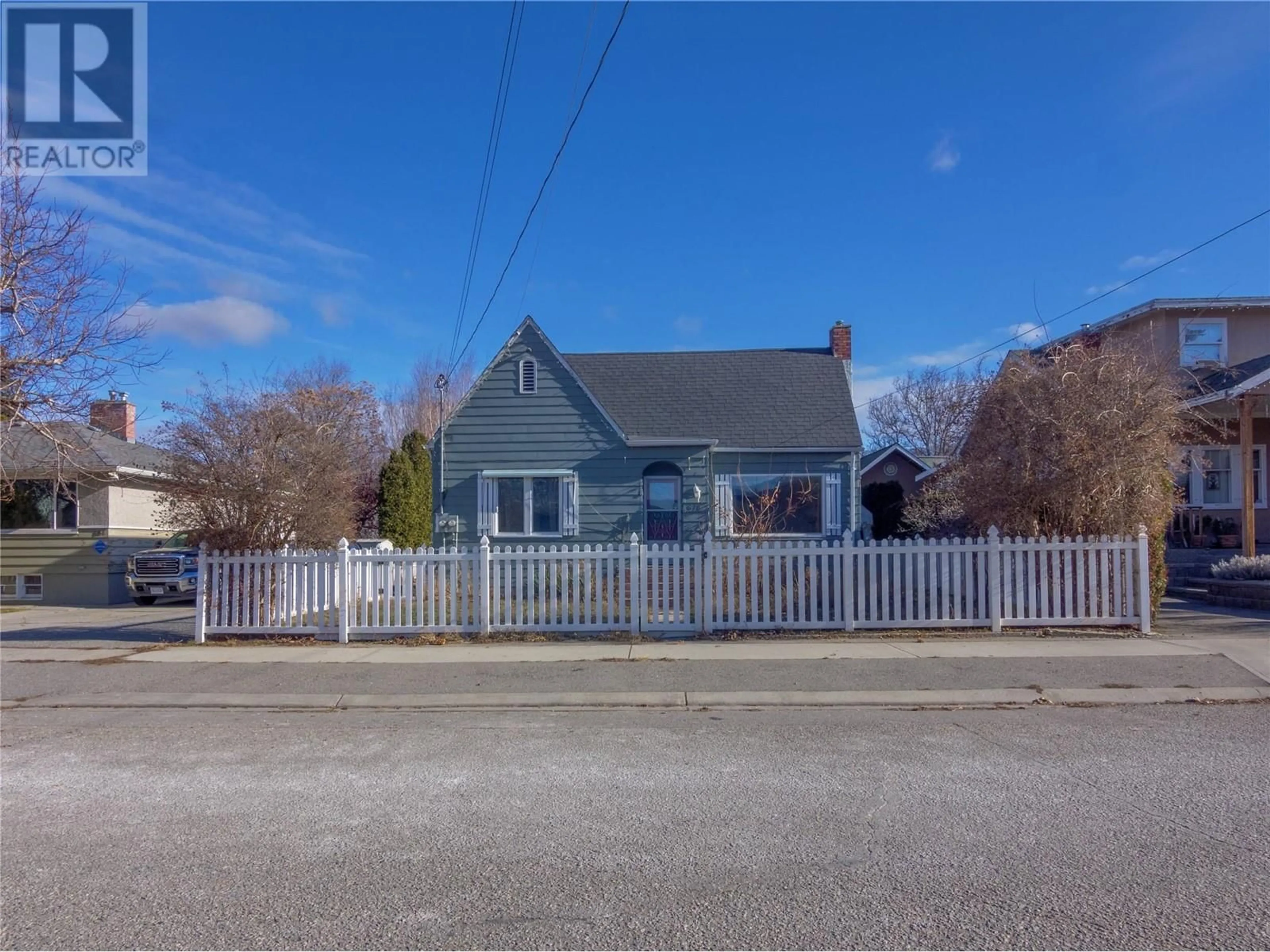 A pic from outside/outdoor area/front of a property/back of a property/a pic from drone, street for 678 Latimer Street, Penticton British Columbia V2A5R6