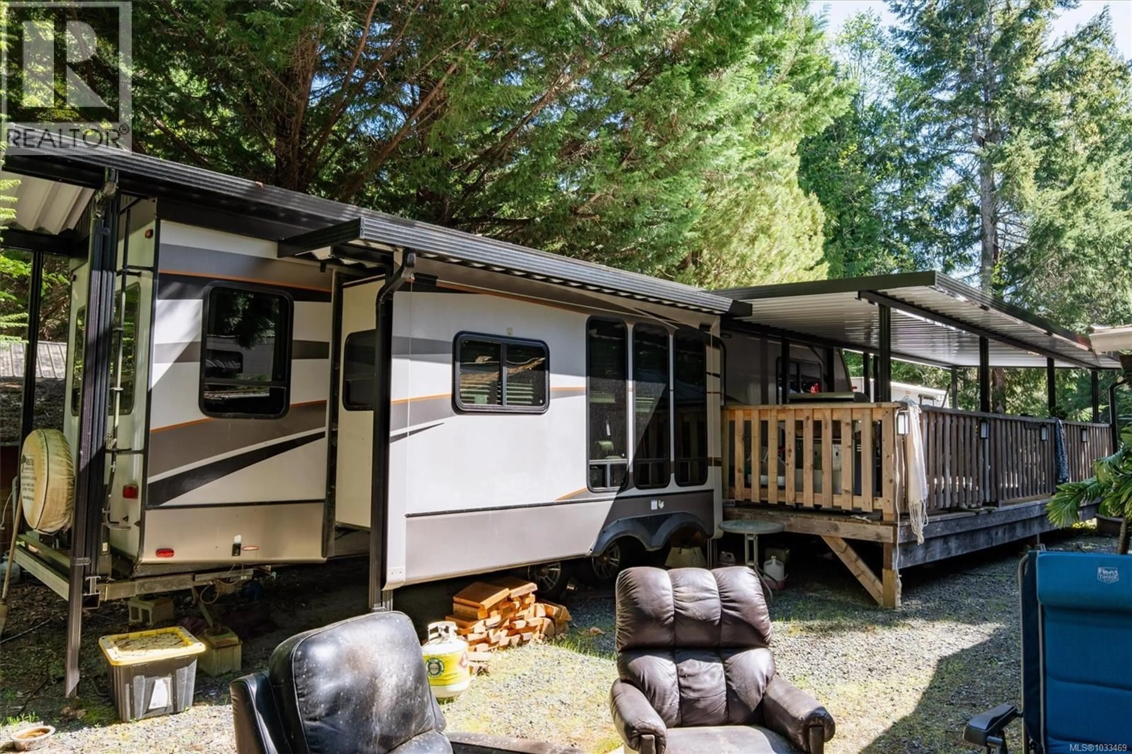 Home with vinyl exterior material, forest/trees view for E14 - 2650 TURNBULL ROAD, Qualicum Beach British Columbia V9K2R2