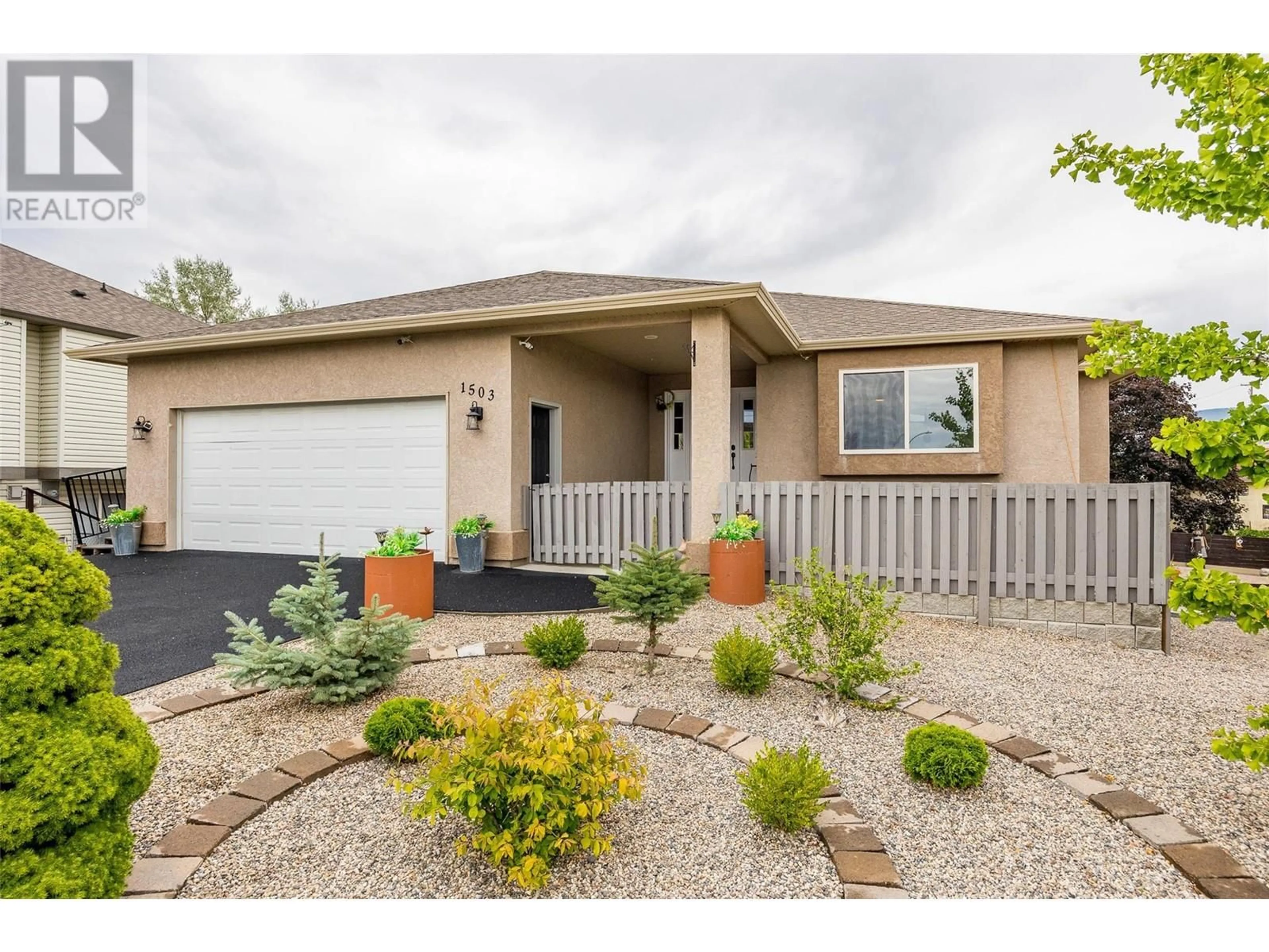 Home with vinyl exterior material, street for 1503 TANEMURA CRESCENT, Kelowna British Columbia V1P1N8