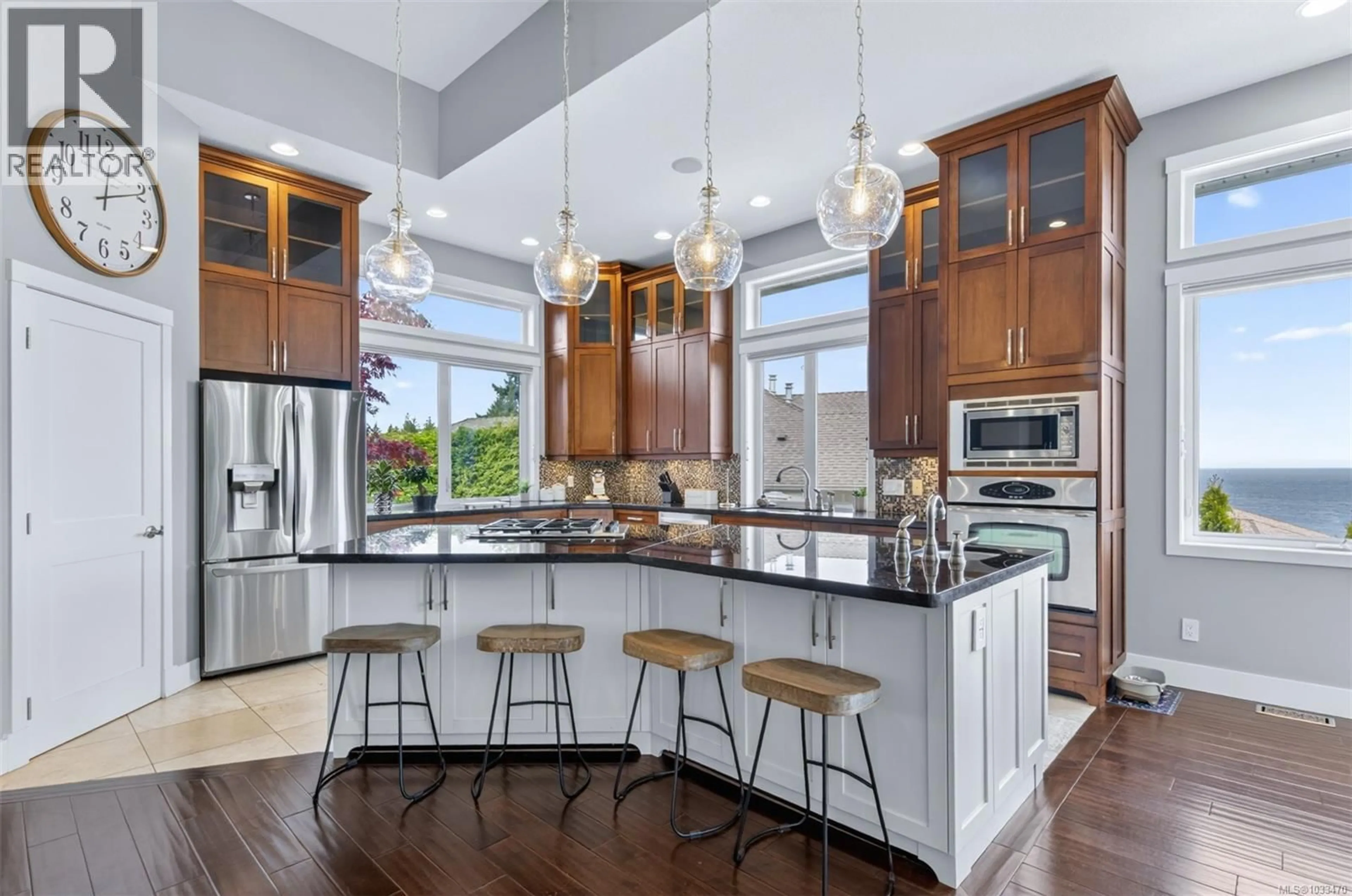 Open concept kitchen, ceramic/tile floor for 5676 MUGGIES WAY, Nanaimo British Columbia V9V1W2