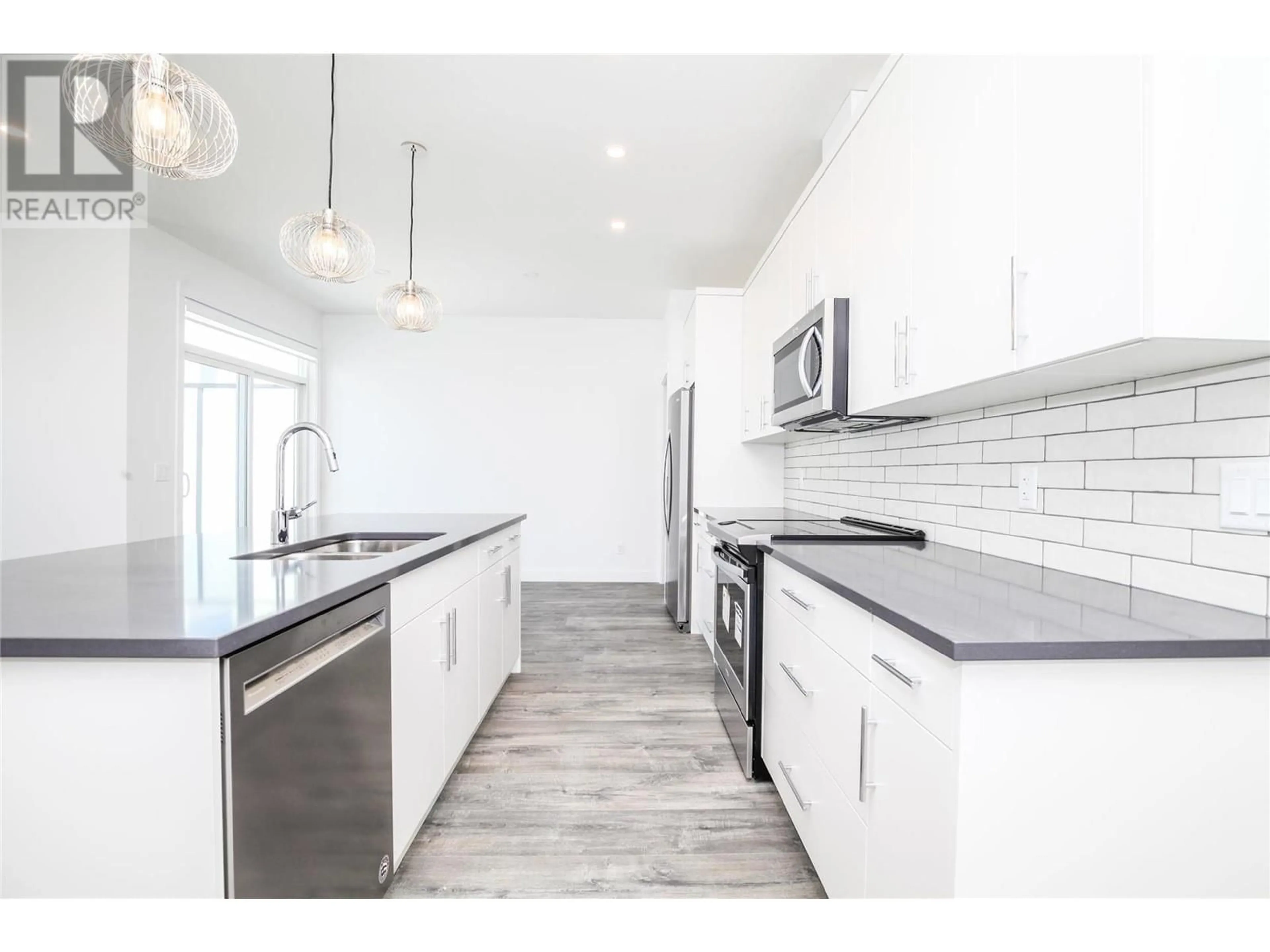 Open concept kitchen, unknown for 610 Academy Way Unit# 118, Kelowna British Columbia V1V0E8