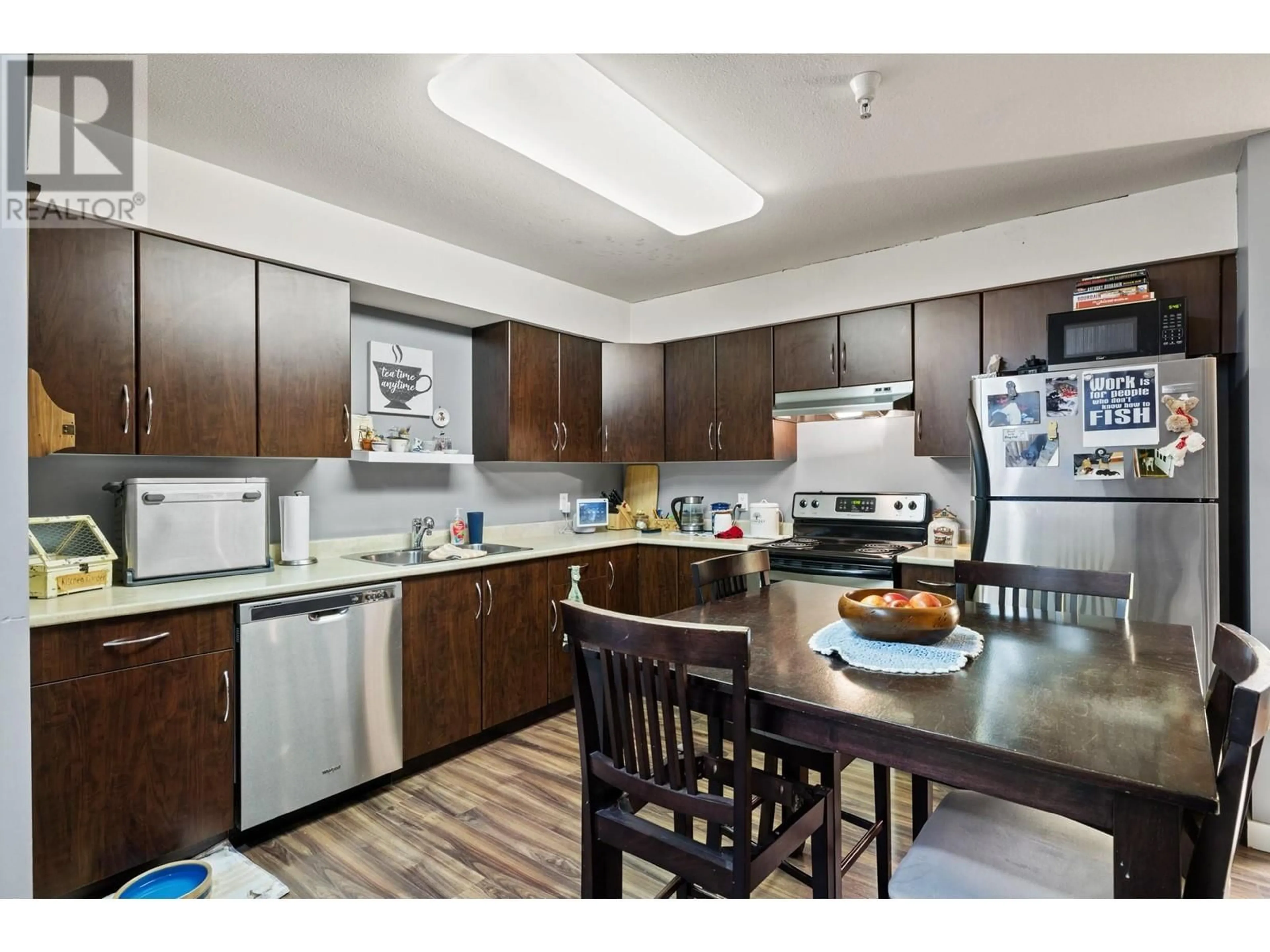 Standard kitchen, wood/laminate floor for 201 - 1481 GLENMORE ROAD, Kelowna British Columbia V1V2C5