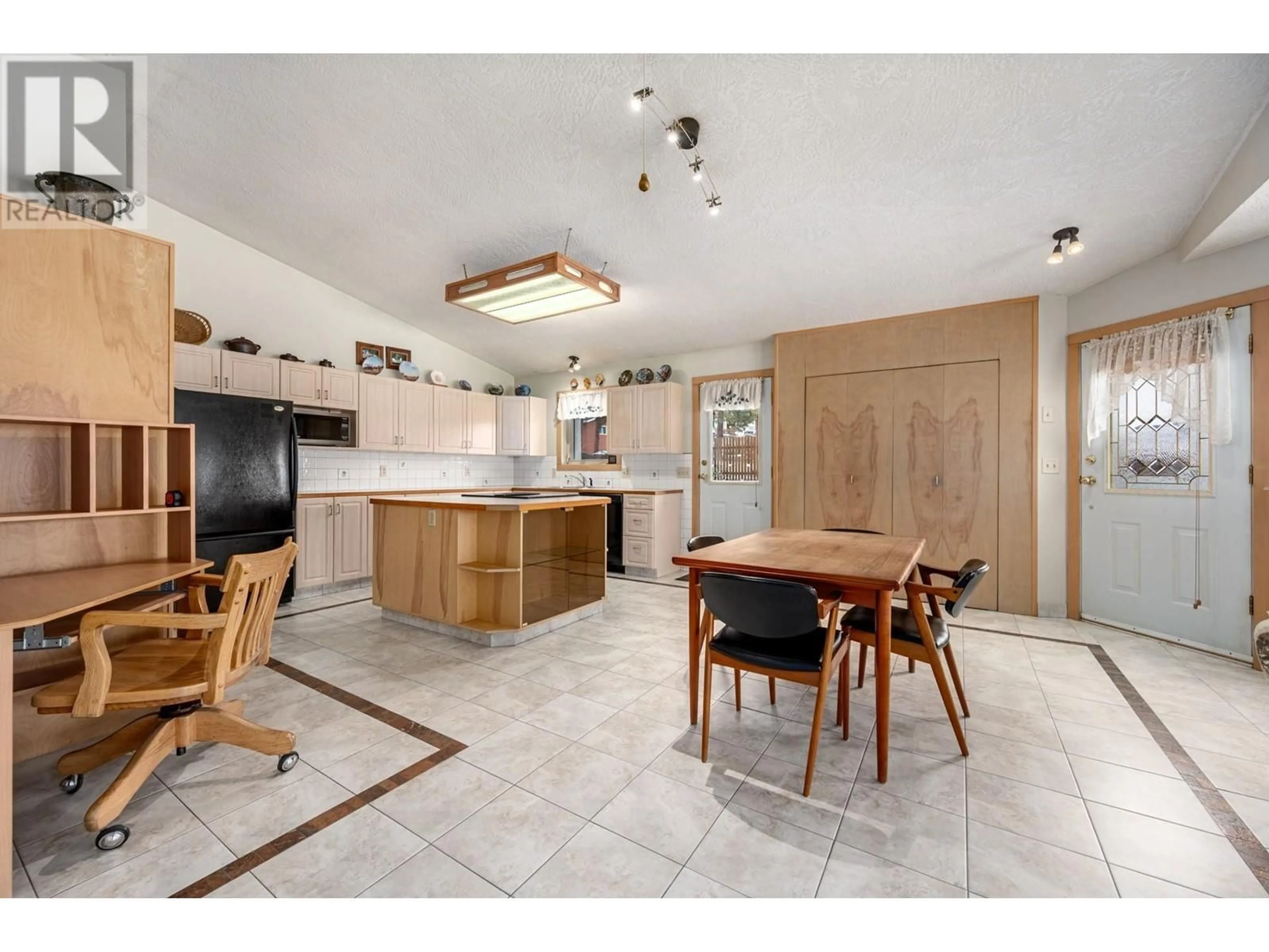 Open concept kitchen, ceramic/tile floor for 2599 Forksdale Avenue, Merritt British Columbia V1K1P8