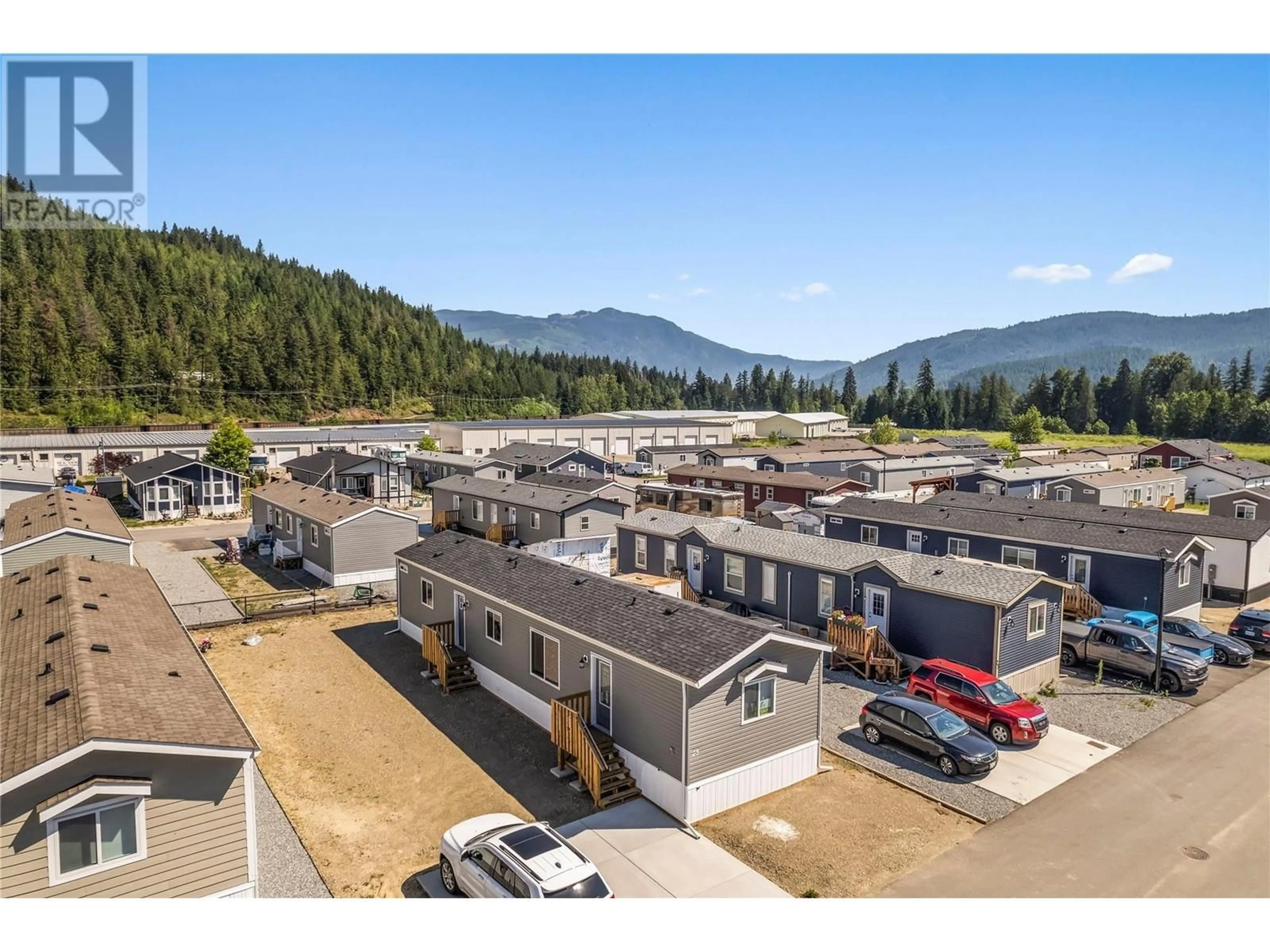 A pic from outside/outdoor area/front of a property/back of a property/a pic from drone, mountain view for 1705 Hillier Road E Unit# 28, Sicamous British Columbia V0E2V4