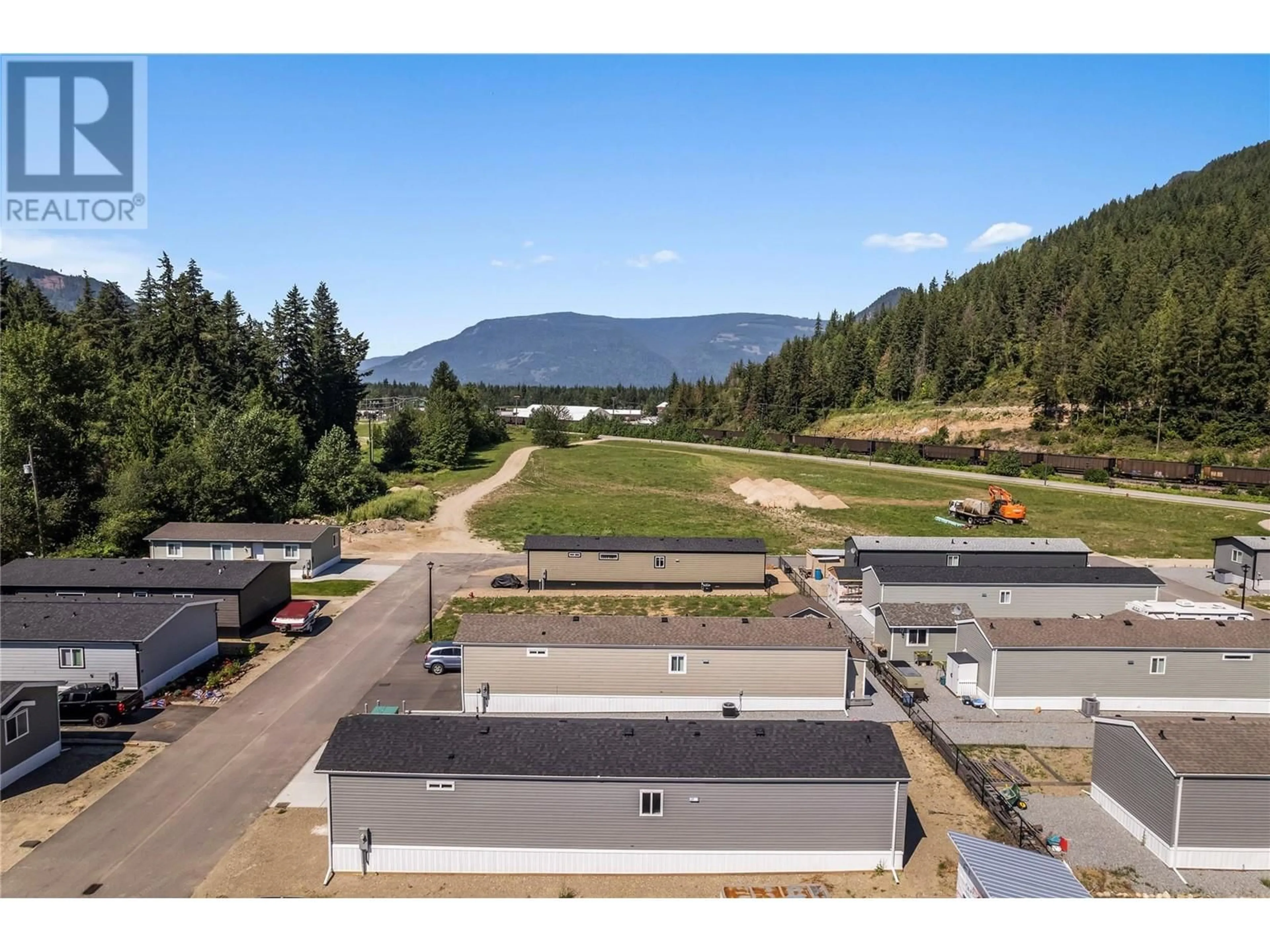 A pic from outside/outdoor area/front of a property/back of a property/a pic from drone, mountain view for 1705 Hillier Road E Unit# 28, Sicamous British Columbia V0E2V4