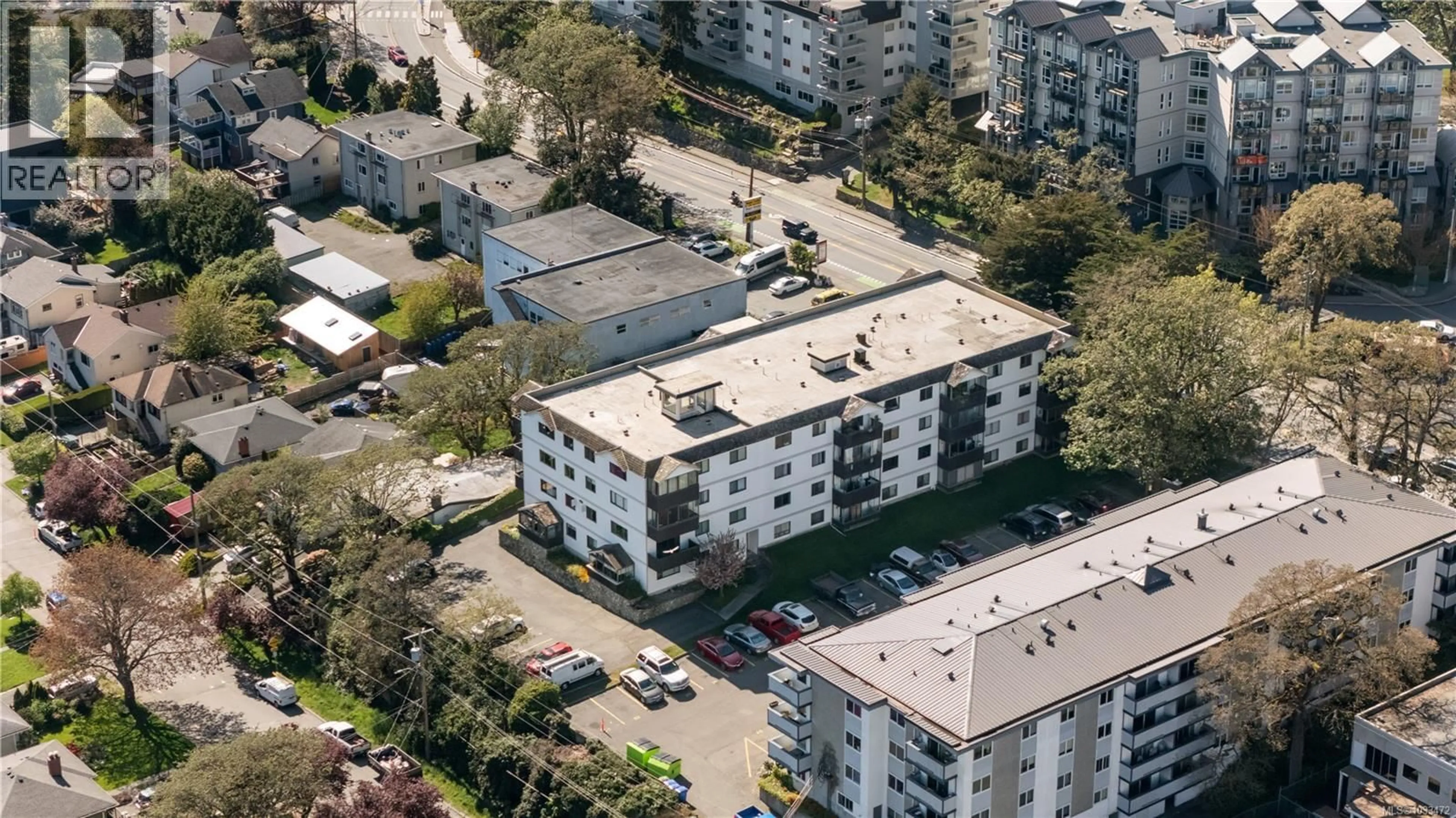 A pic from outside/outdoor area/front of a property/back of a property/a pic from drone, city buildings view from balcony for 202 - 929 ESQUIMALT ROAD, Esquimalt British Columbia V9A3M7