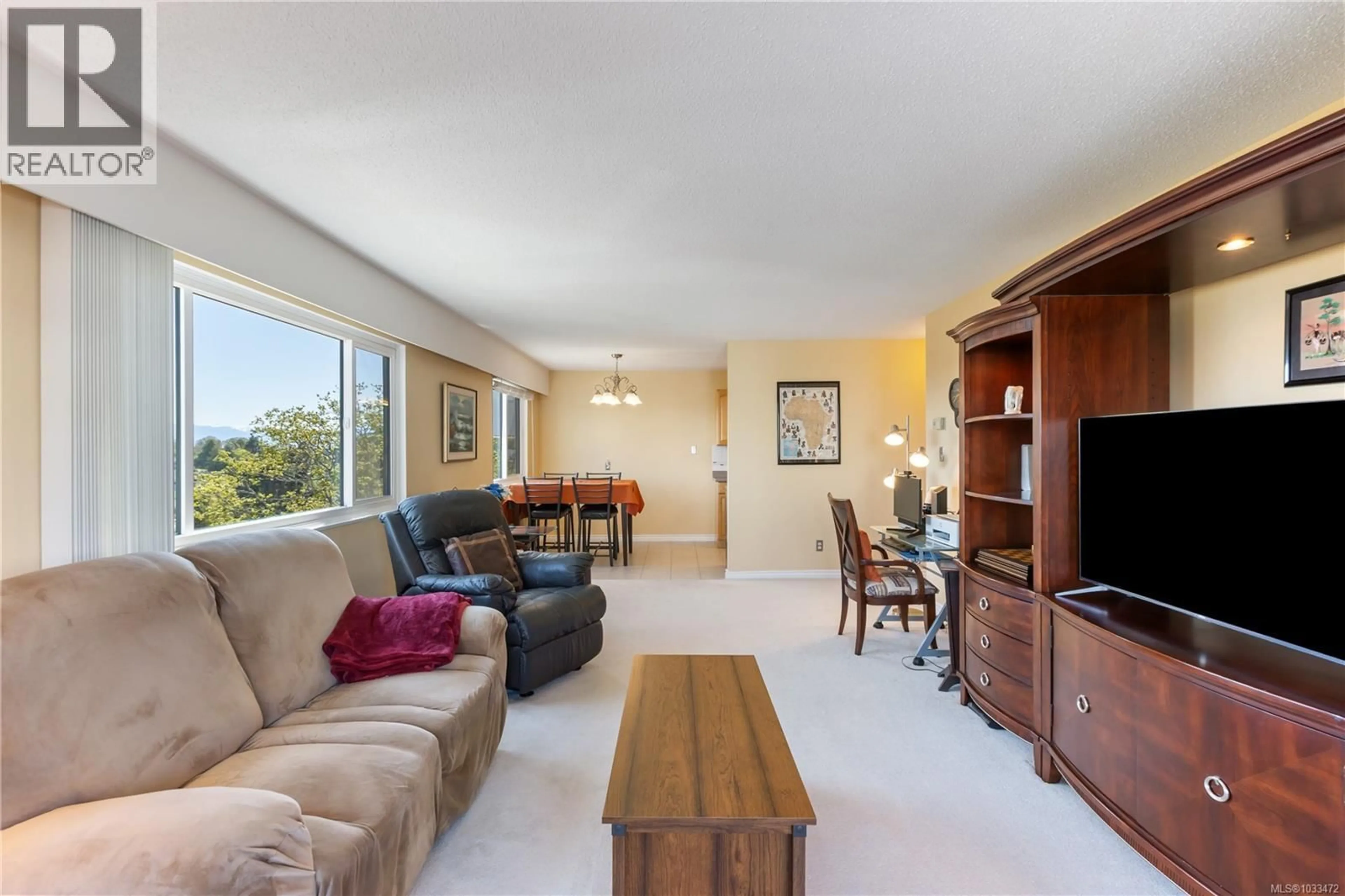 Living room with furniture, unknown for 202 - 929 ESQUIMALT ROAD, Esquimalt British Columbia V9A3M7