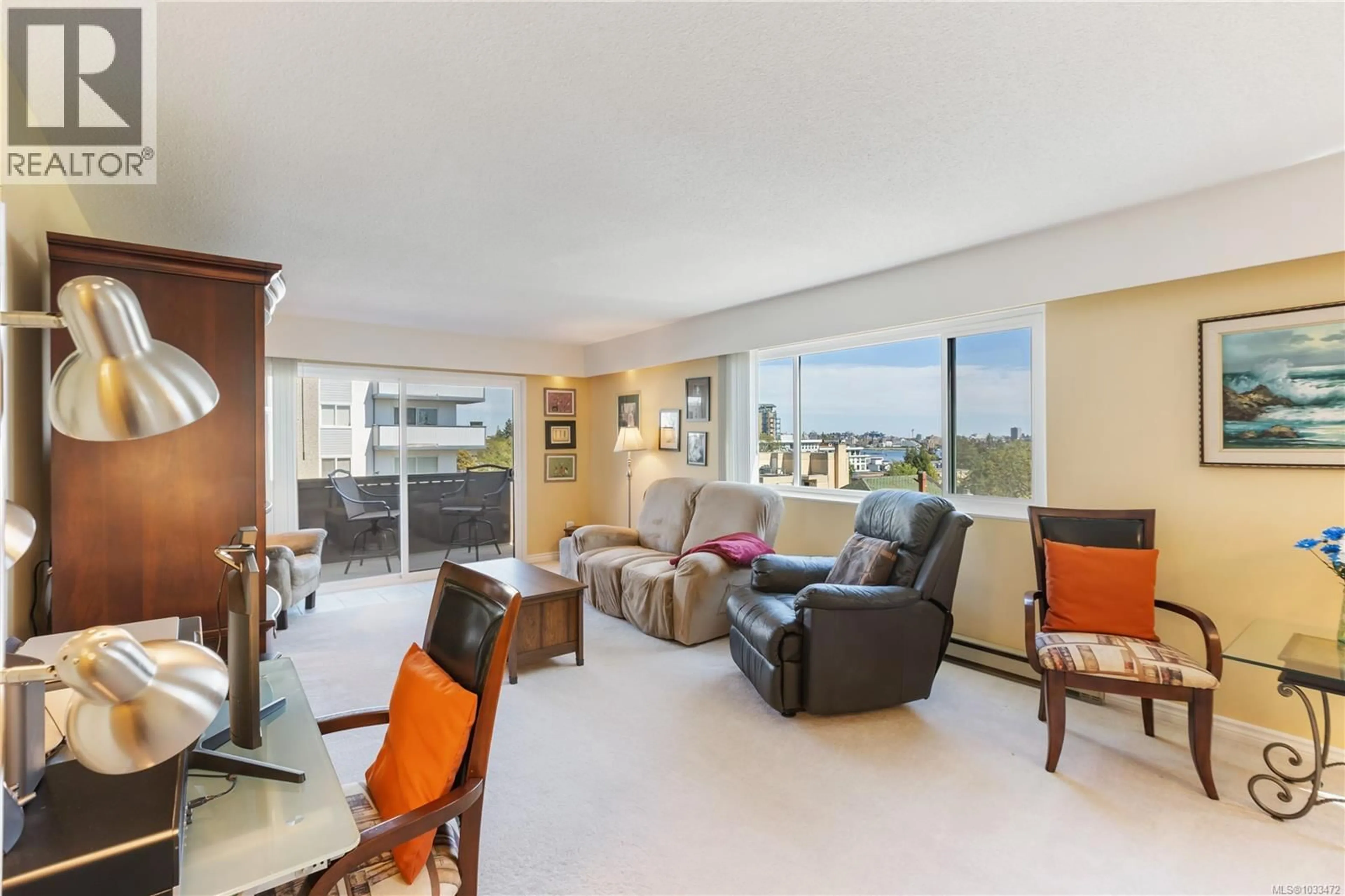 Living room with furniture, unknown for 202 - 929 ESQUIMALT ROAD, Esquimalt British Columbia V9A3M7