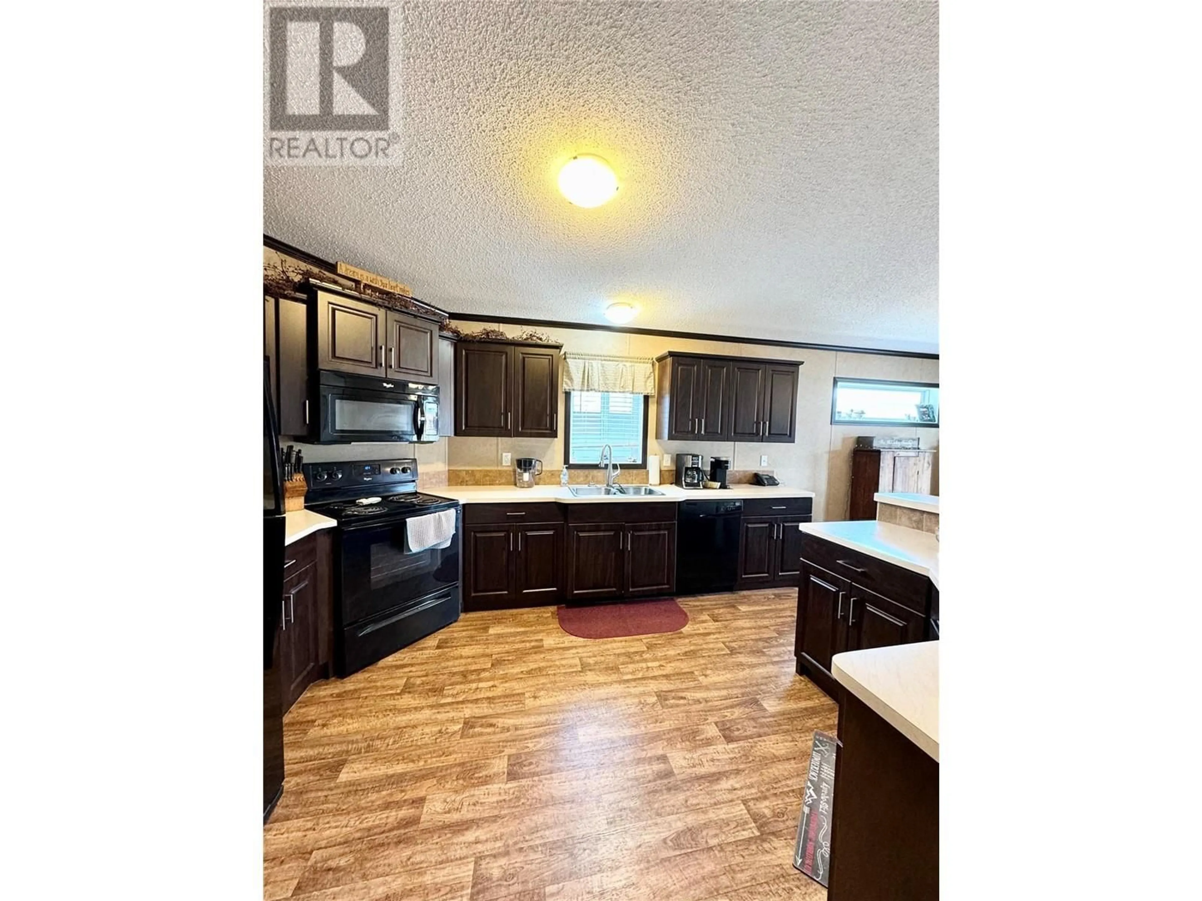 Open concept kitchen, unknown for 2581 Spring Bank Avenue, Merritt British Columbia V1K1S1