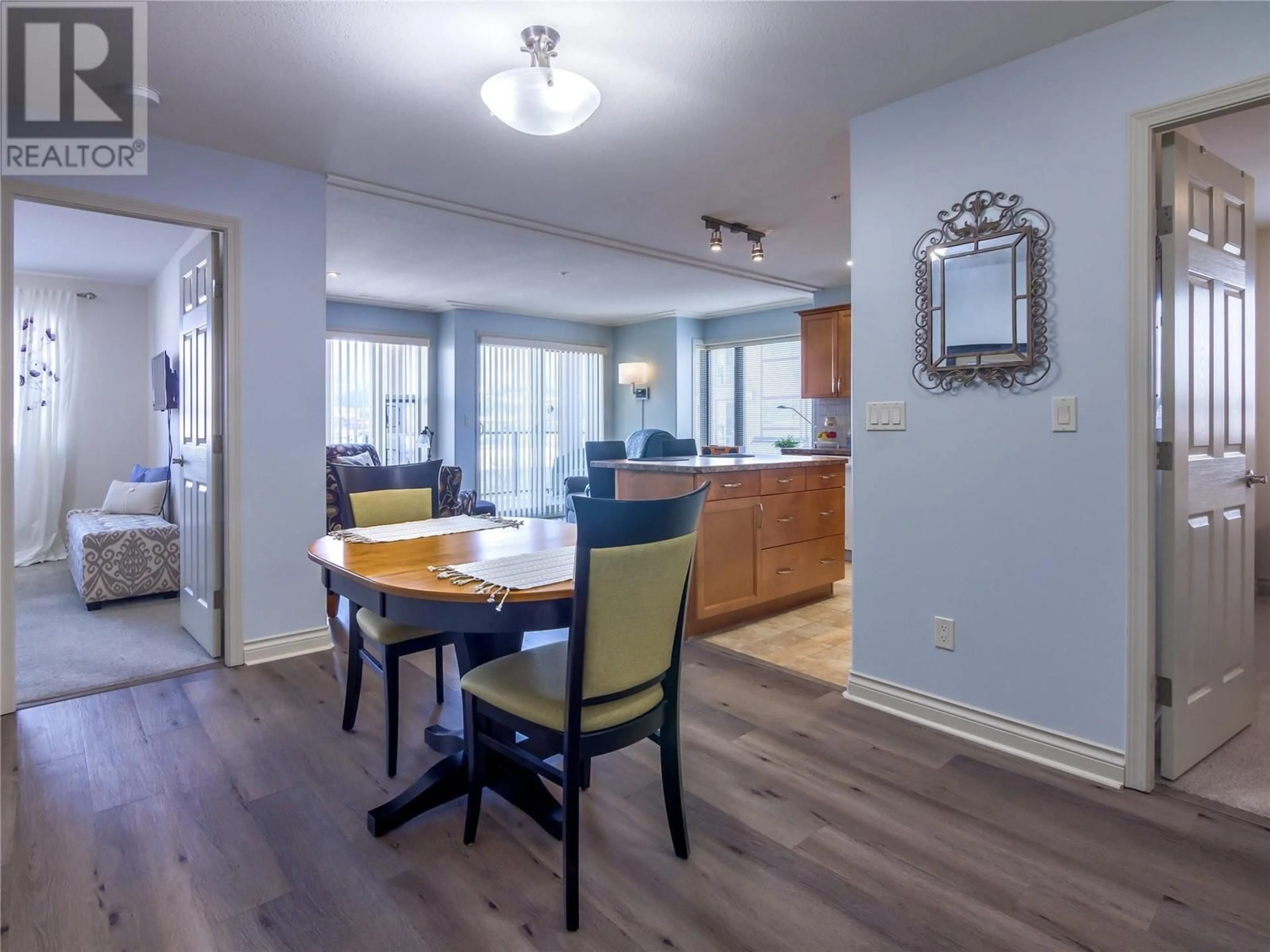 Dining room, wood/laminate floor for 2113 Atkinson Street Unit# 602, Penticton British Columbia V2A8R5