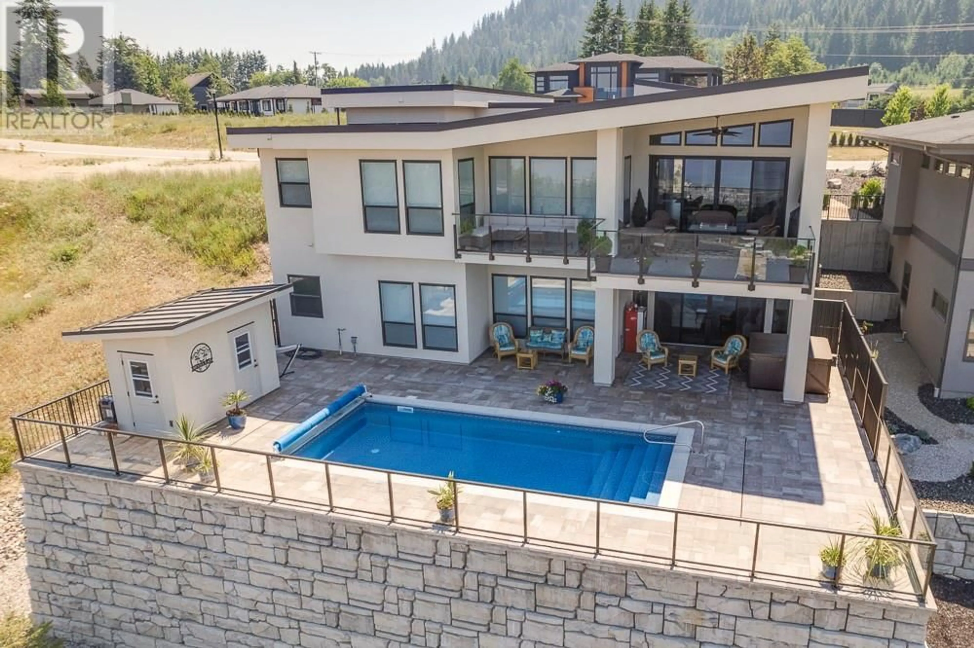 A pic from outside/outdoor area/front of a property/back of a property/a pic from drone, mountain view for 1111 19 Avenue SE, Salmon Arm British Columbia V1E4R5