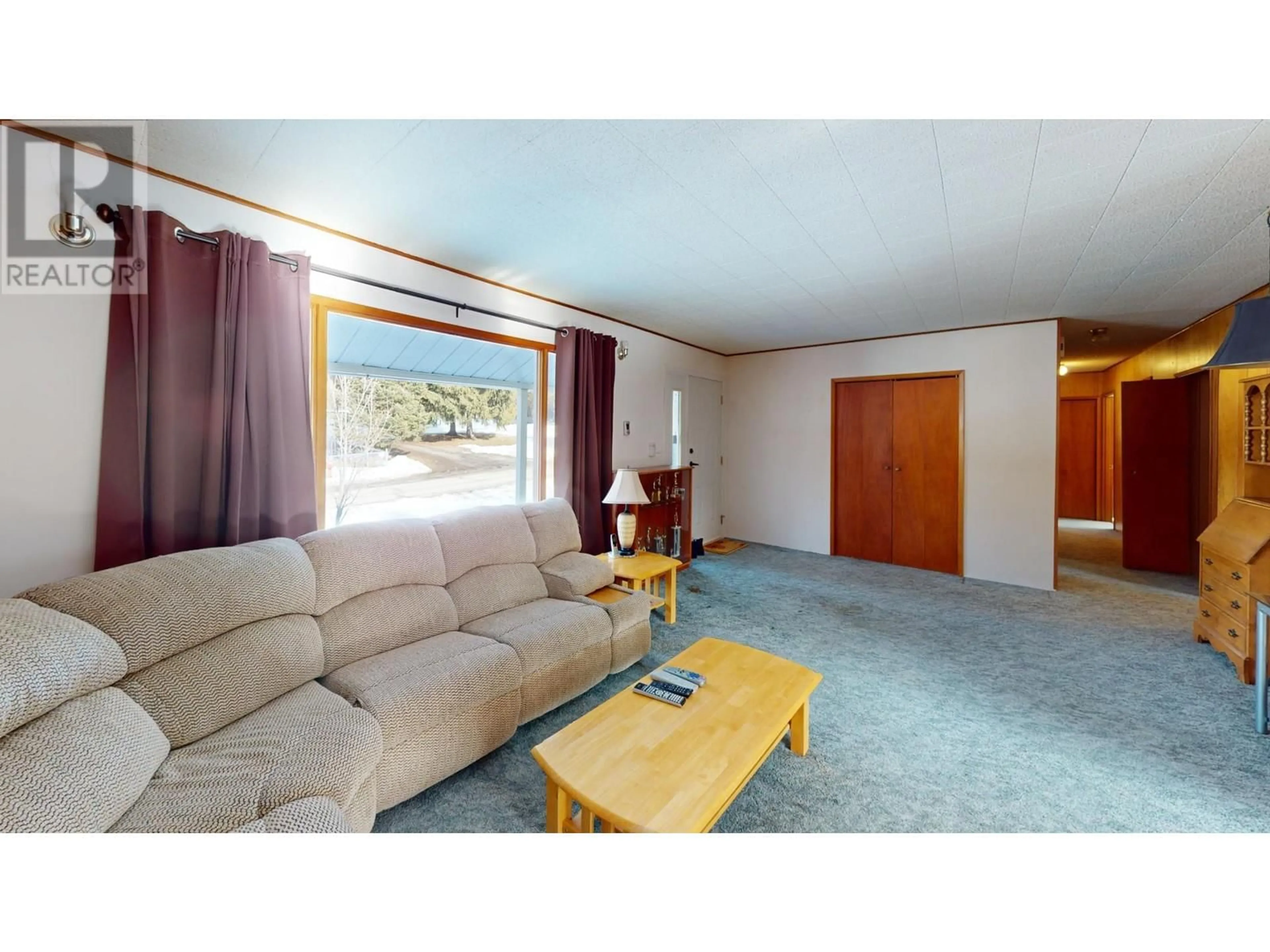 Living room with furniture, unknown for 99 TAMARAC AVENUE, Fruitvale British Columbia V0G1L0