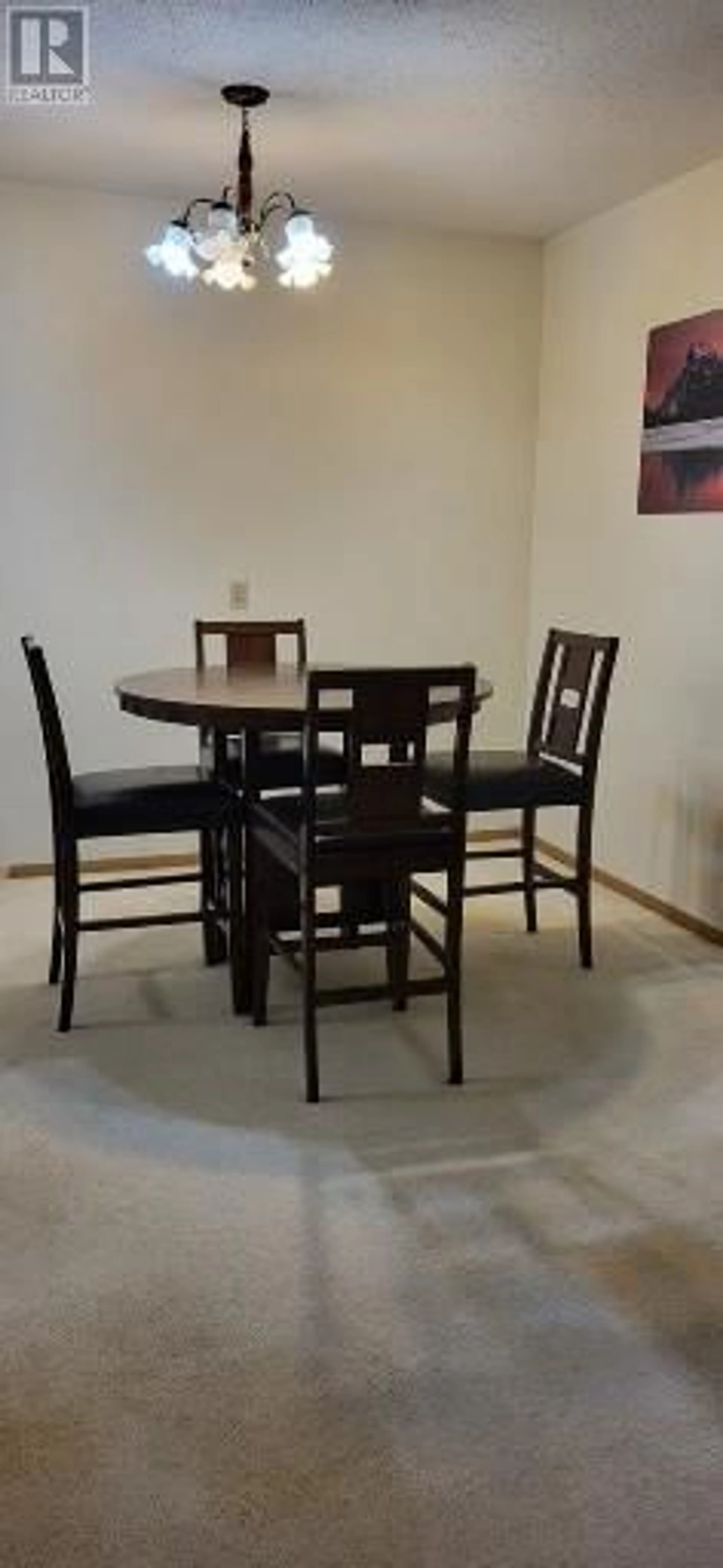 Dining room, wood/laminate floor for 1299 PONDEROSA Drive Unit# 103B, Sparwood British Columbia V0B2G2