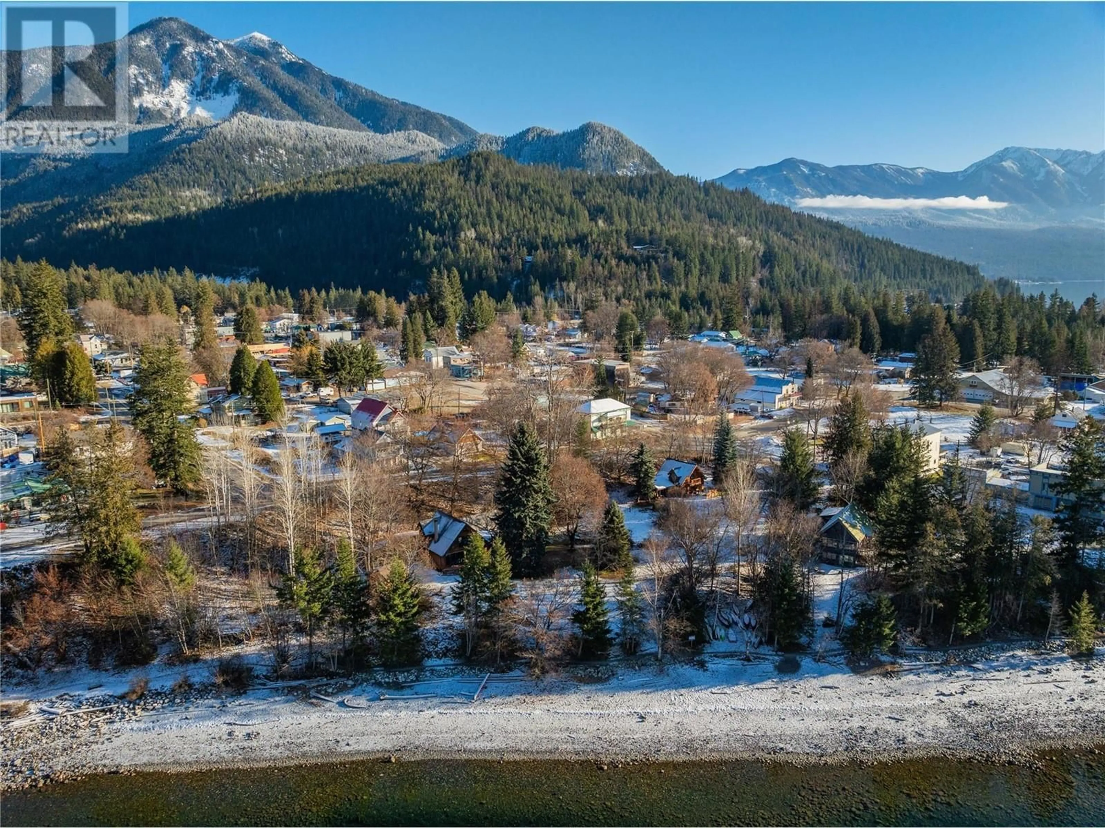 A pic from outside/outdoor area/front of a property/back of a property/a pic from drone, mountain view for 802 Becker Lane, New Denver British Columbia V0G1S0