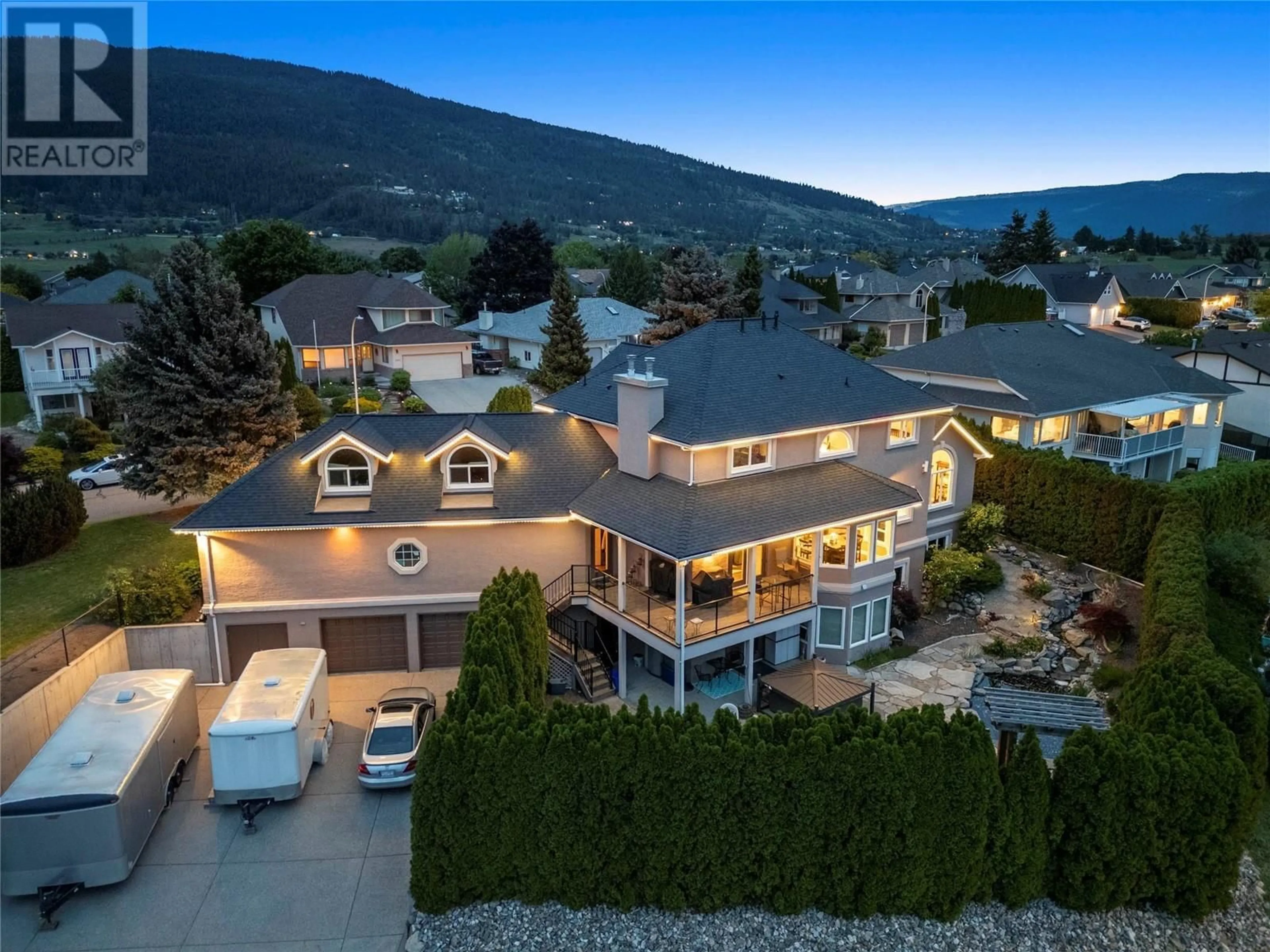 A pic from outside/outdoor area/front of a property/back of a property/a pic from drone, mountain view for 4400 Crystal Drive, Vernon British Columbia V1T8V5