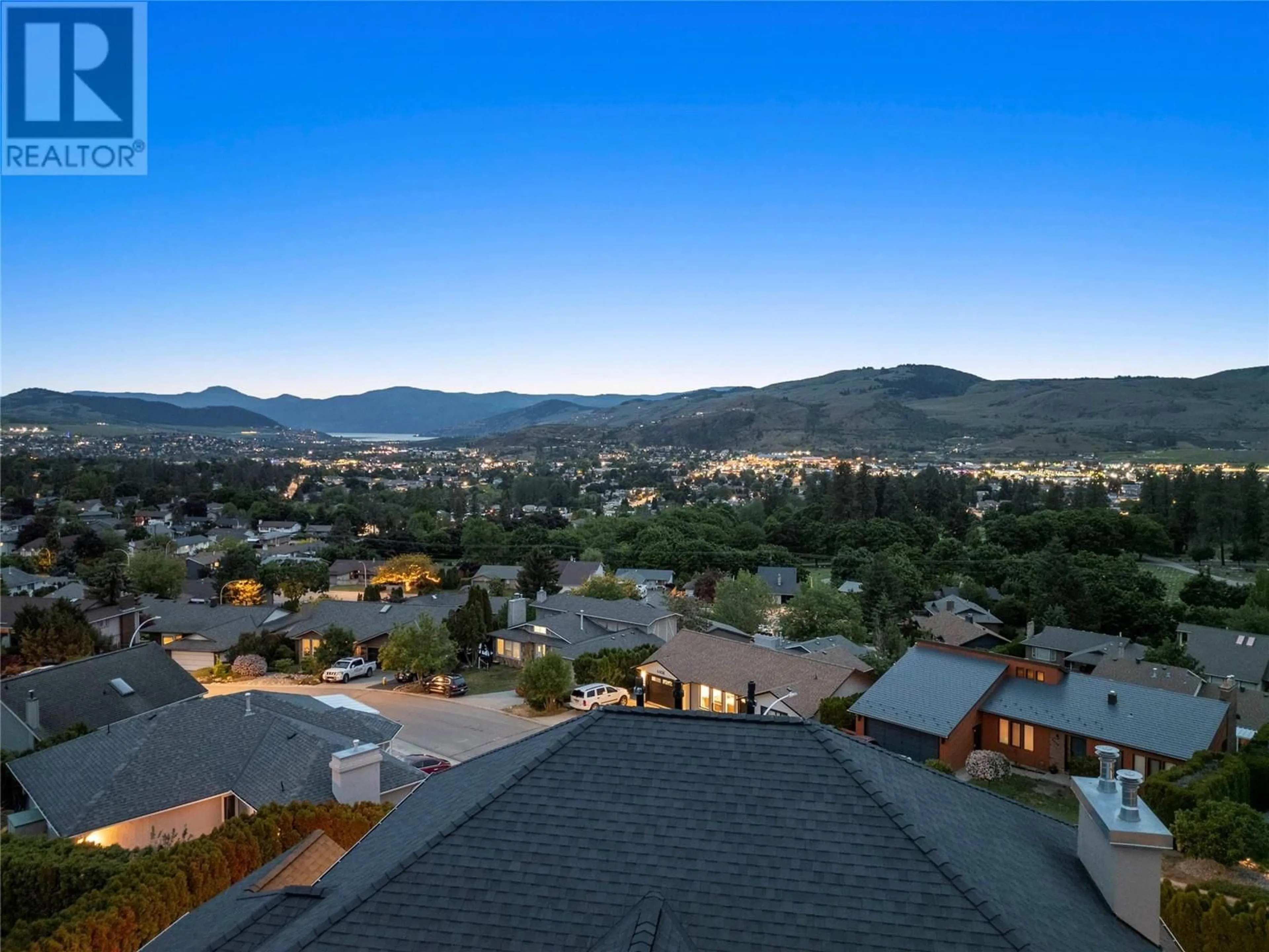 A pic from outside/outdoor area/front of a property/back of a property/a pic from drone, mountain view for 4400 Crystal Drive, Vernon British Columbia V1T8V5