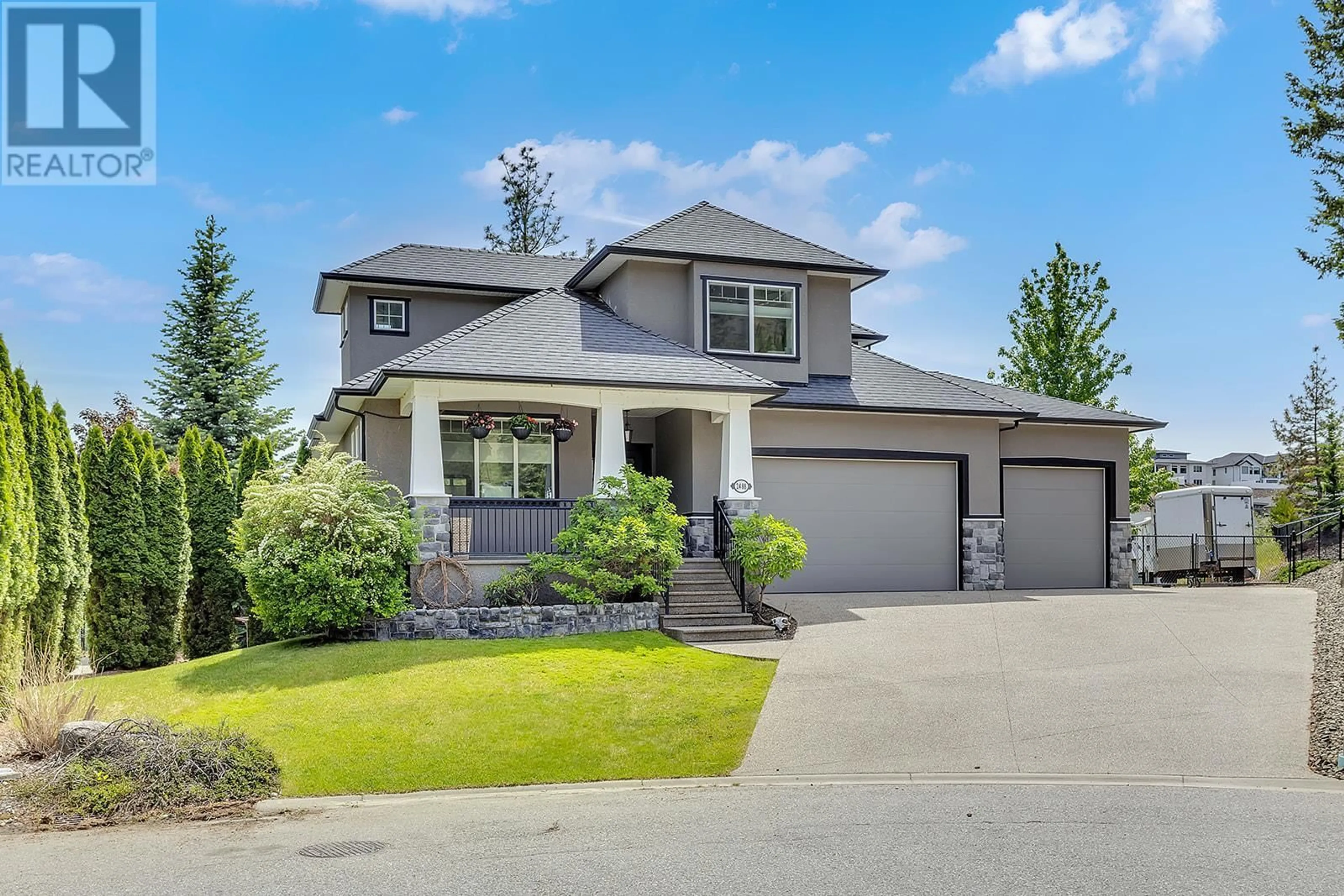 Home with vinyl exterior material, street for 2488 Stone Grove Crescent, West Kelowna British Columbia V4T3A8