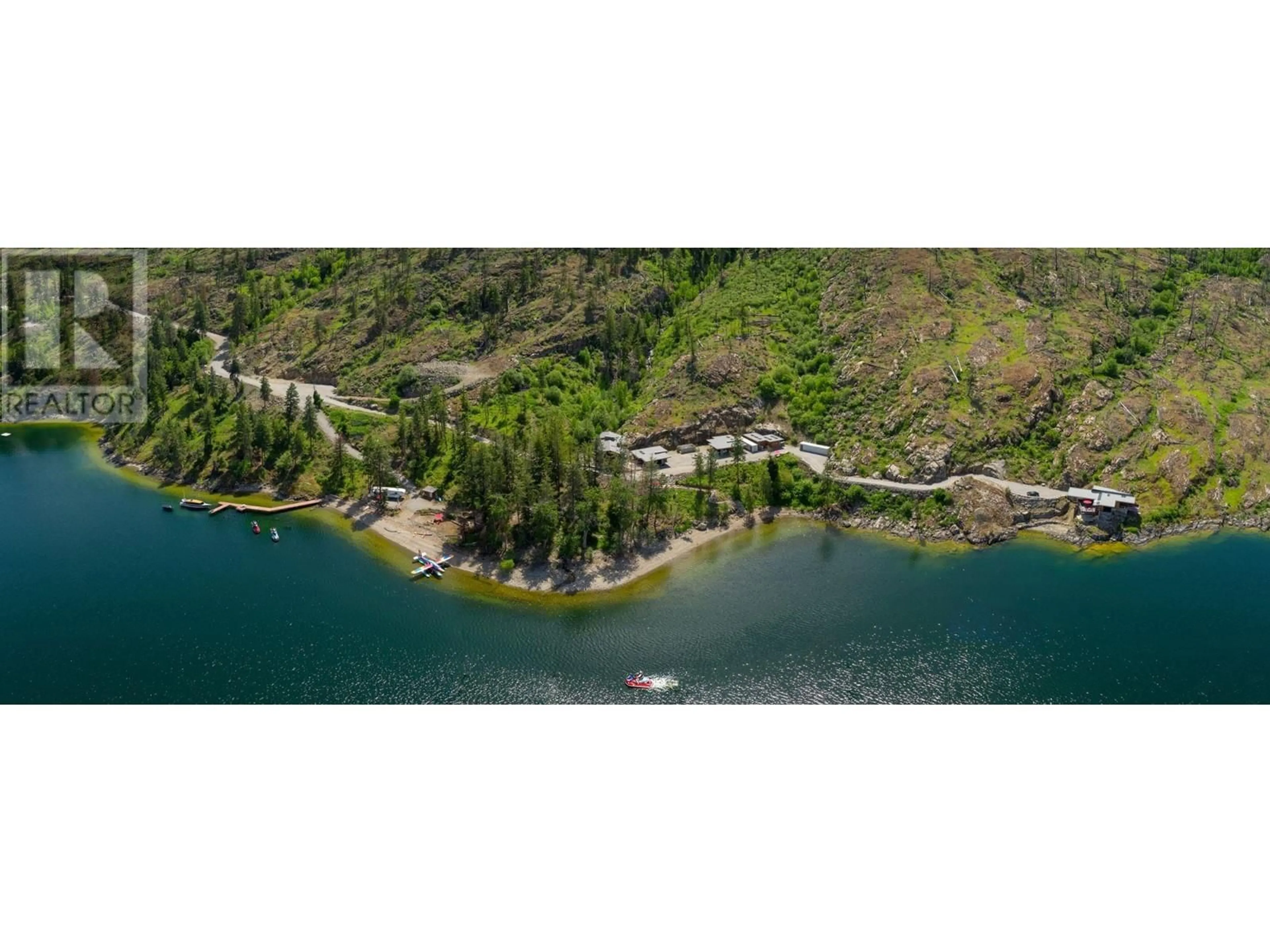 A pic from outside/outdoor area/front of a property/back of a property/a pic from drone, water/lake/river/ocean view for 8888 Lakeshore Road Lot# 1 & 2, Kelowna British Columbia V1W1J5