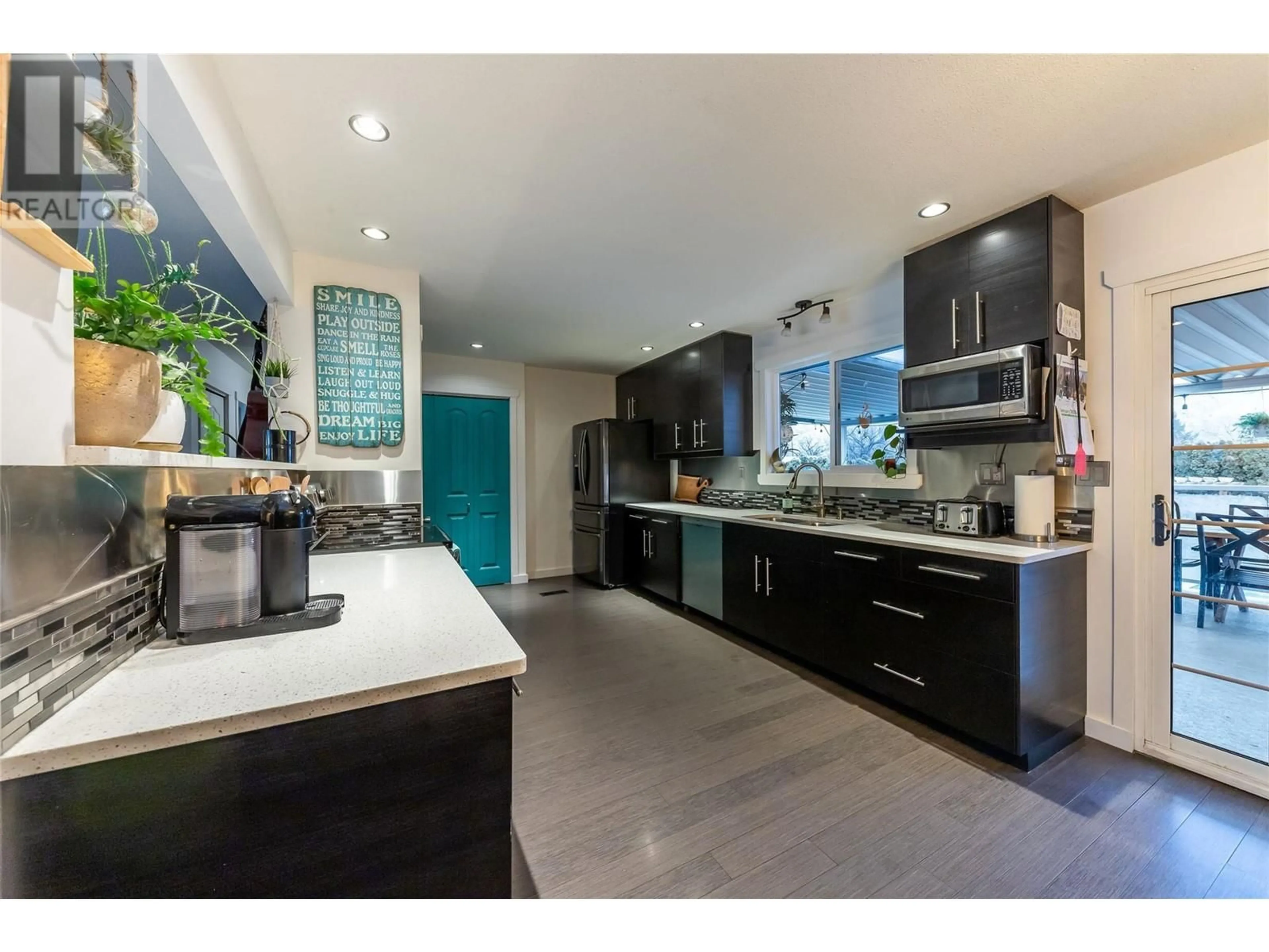 Contemporary kitchen, ceramic/tile floor for 6552 Furrer Road, Kamloops British Columbia V2C4V6