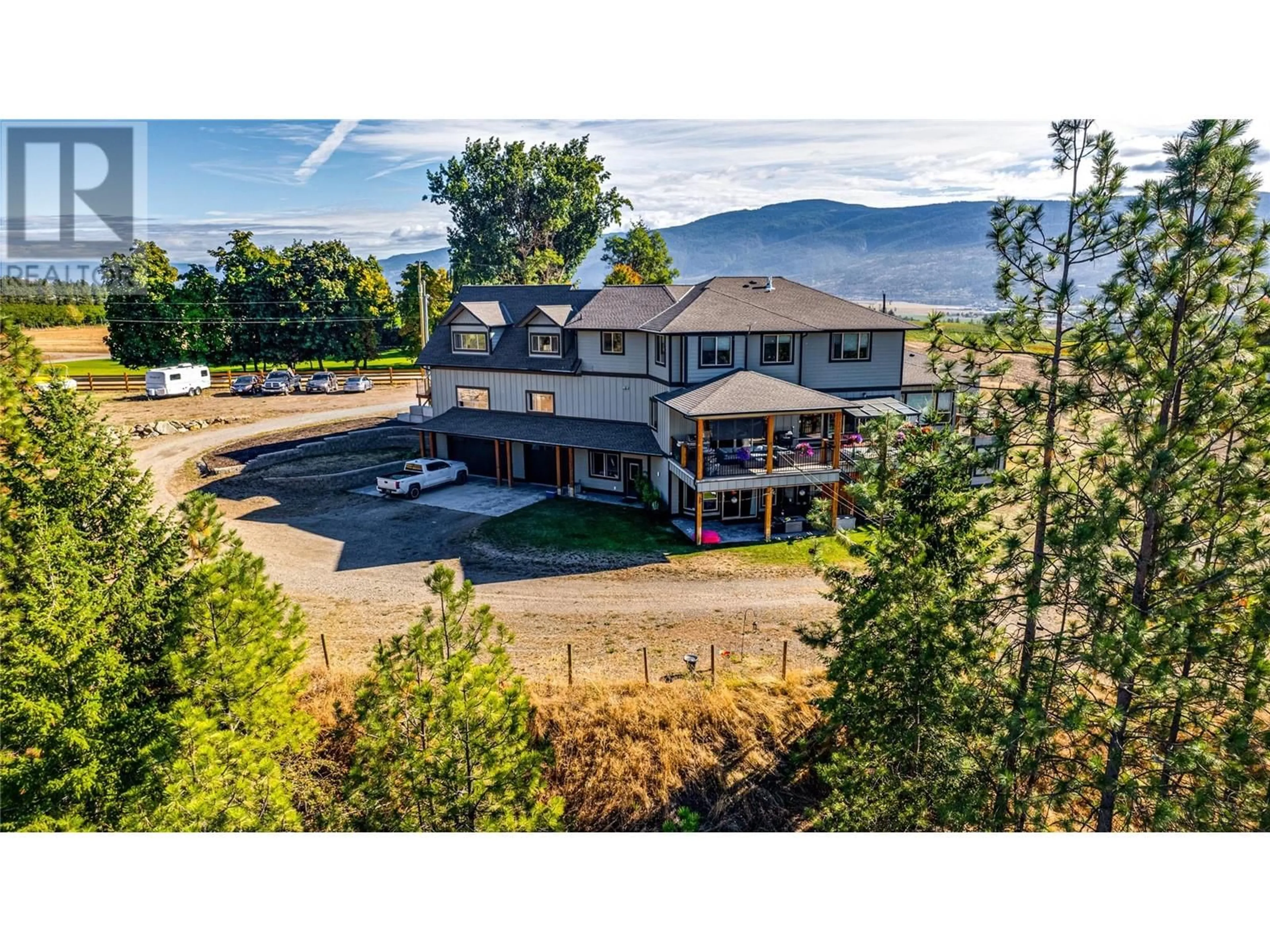 A pic from outside/outdoor area/front of a property/back of a property/a pic from drone, mountain view for 645 St Annes Road, Spallumcheen British Columbia V0E1B5