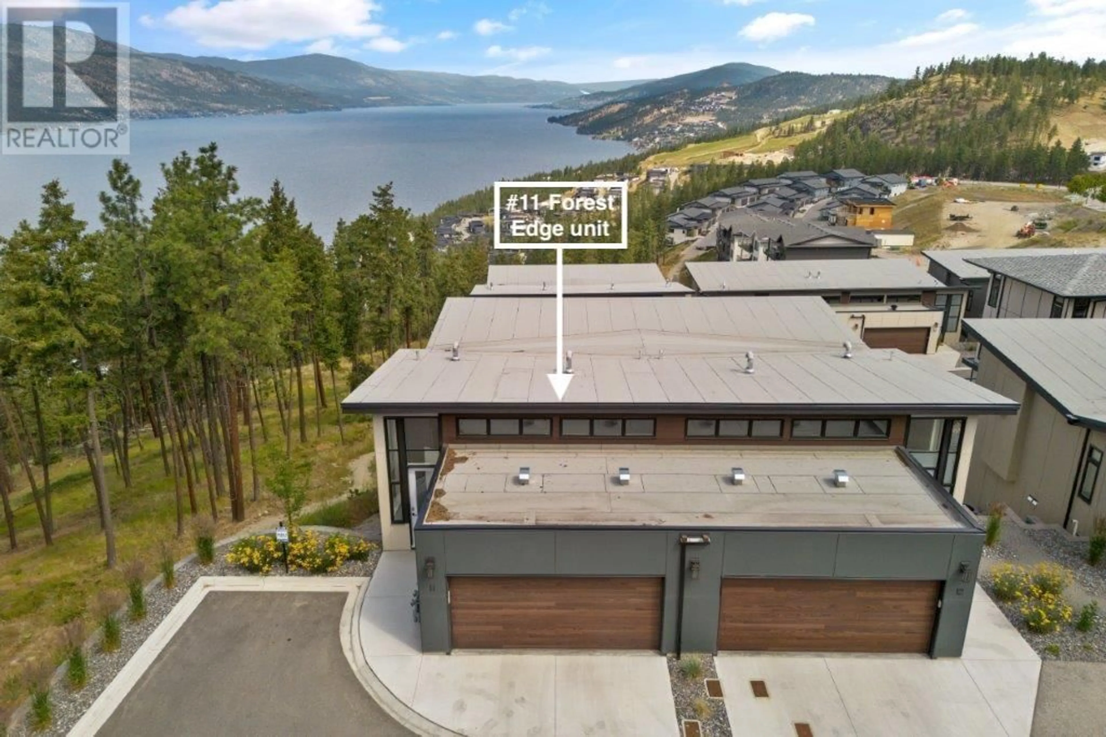 A pic from outside/outdoor area/front of a property/back of a property/a pic from drone, water/lake/river/ocean view for 11 - 3220 HILLTOWN DRIVE, Kelowna British Columbia V1V0C6