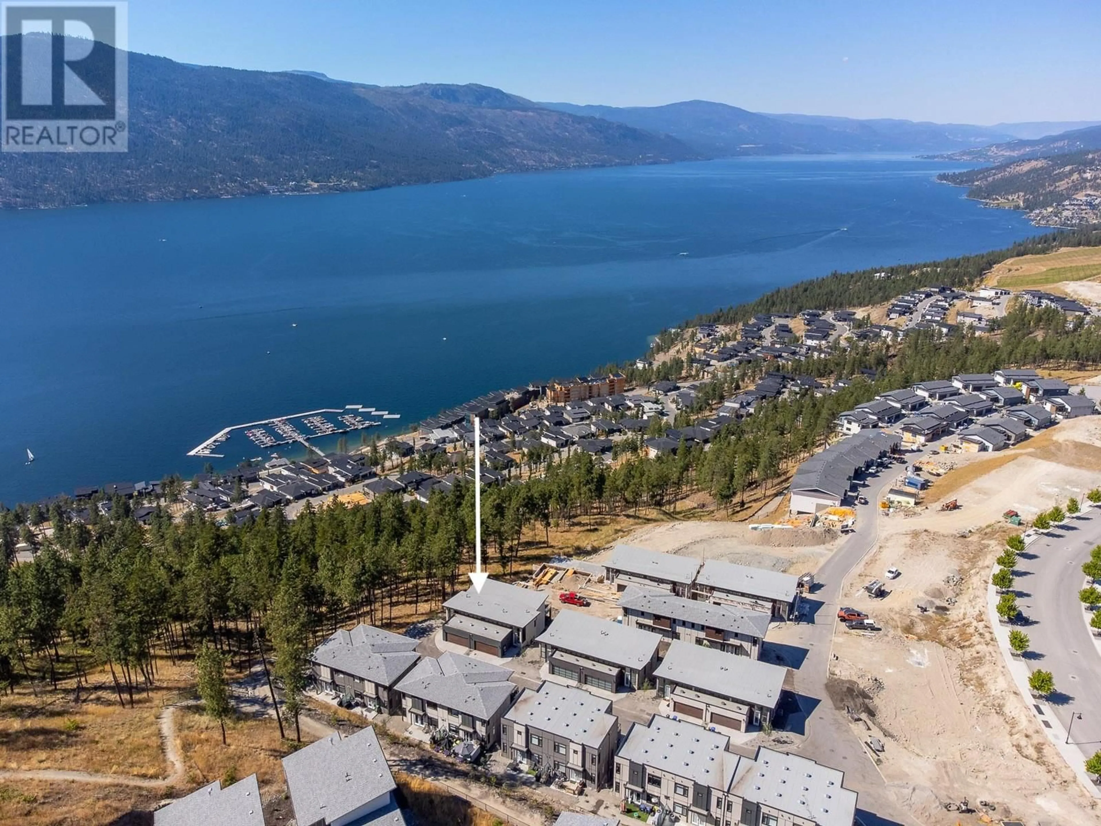 A pic from outside/outdoor area/front of a property/back of a property/a pic from drone, water/lake/river/ocean view for 3220 Hilltown Drive Unit# 11, Kelowna British Columbia V1V0C6