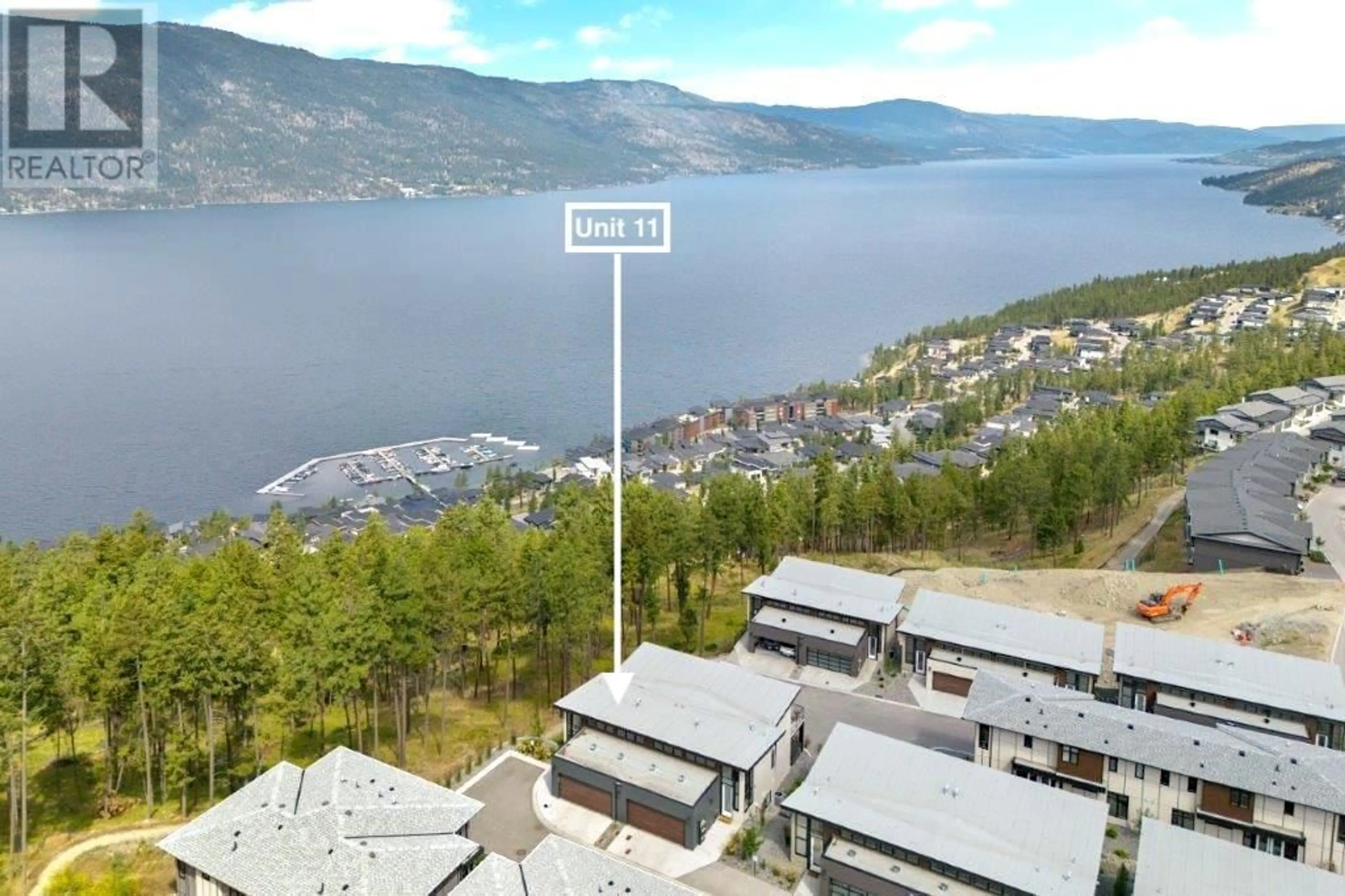 A pic from outside/outdoor area/front of a property/back of a property/a pic from drone, mountain view for 3220 Hilltown Drive Unit# 11, Kelowna British Columbia V1V0C6