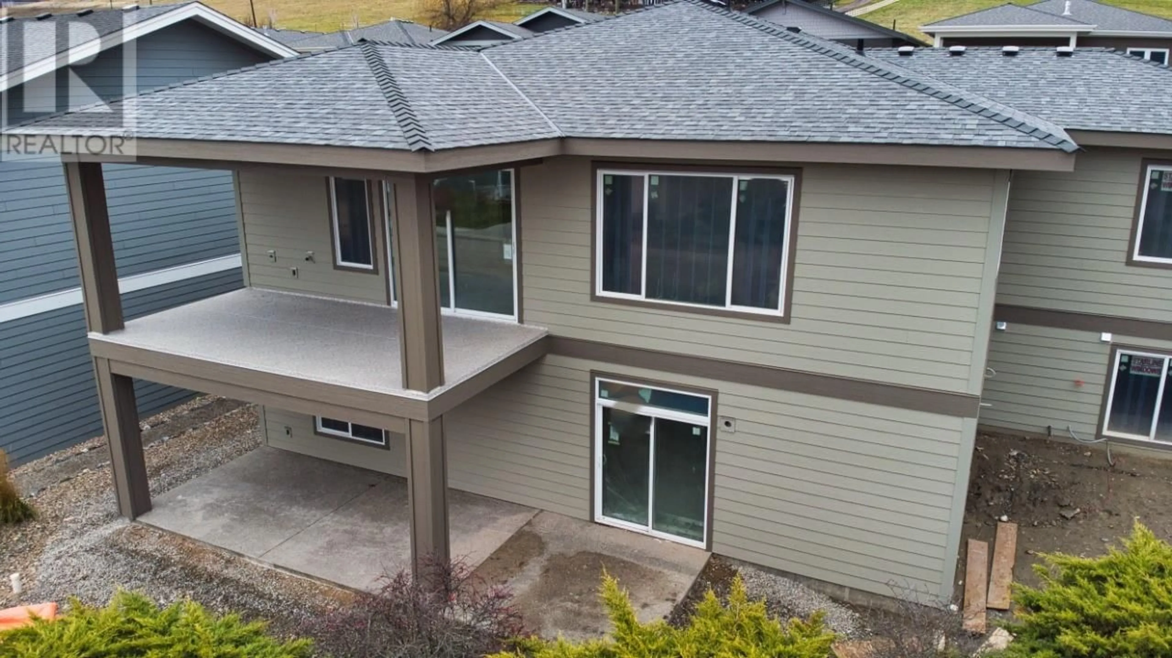 A pic from outside/outdoor area/front of a property/back of a property/a pic from drone, building for 7760 Okanagan Landing Road Unit# 98, Vernon British Columbia V1H1Z4