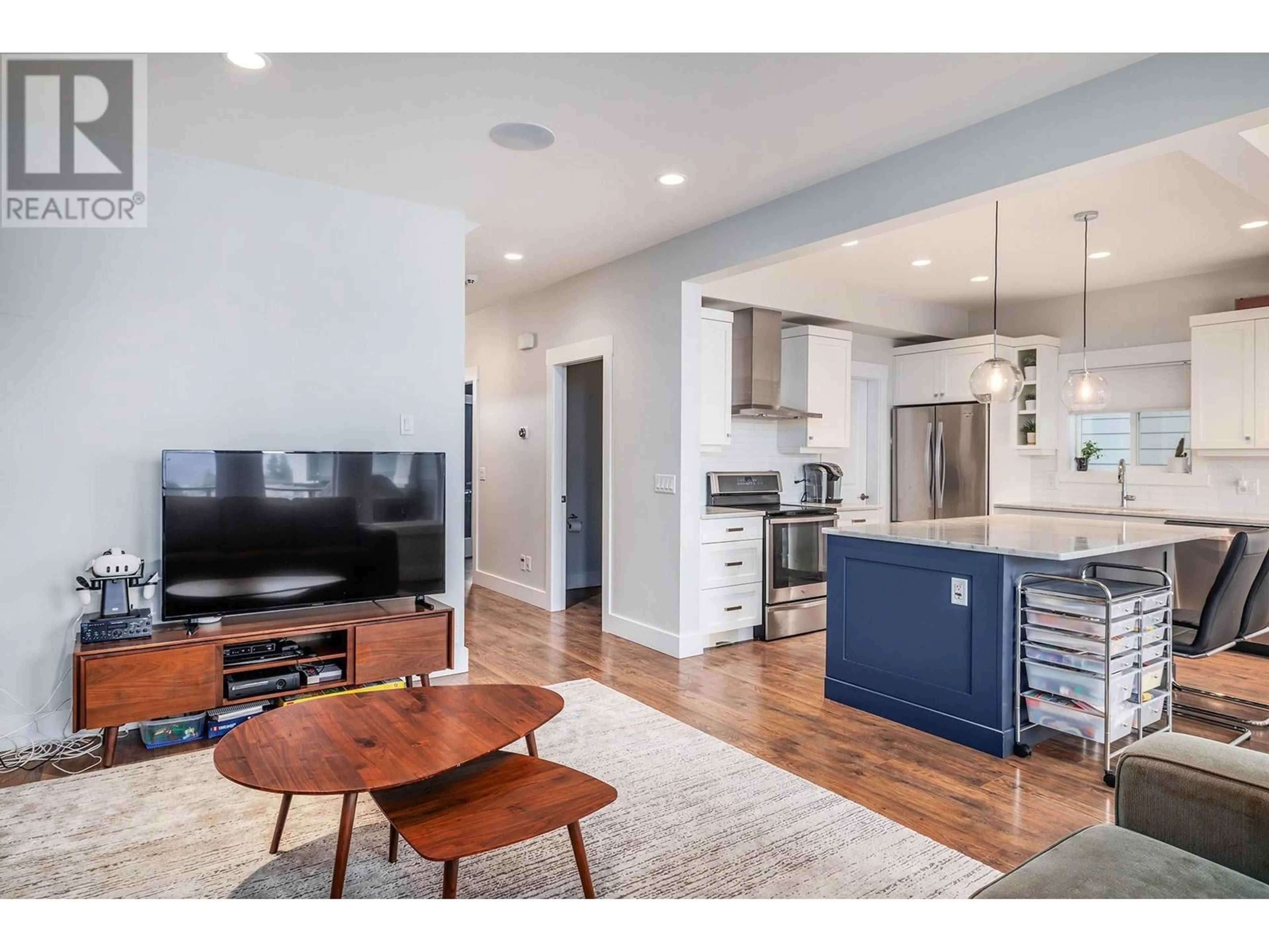 Open concept kitchen, wood/laminate floor for 1164 FROST ROAD, Kelowna British Columbia V1W5M1