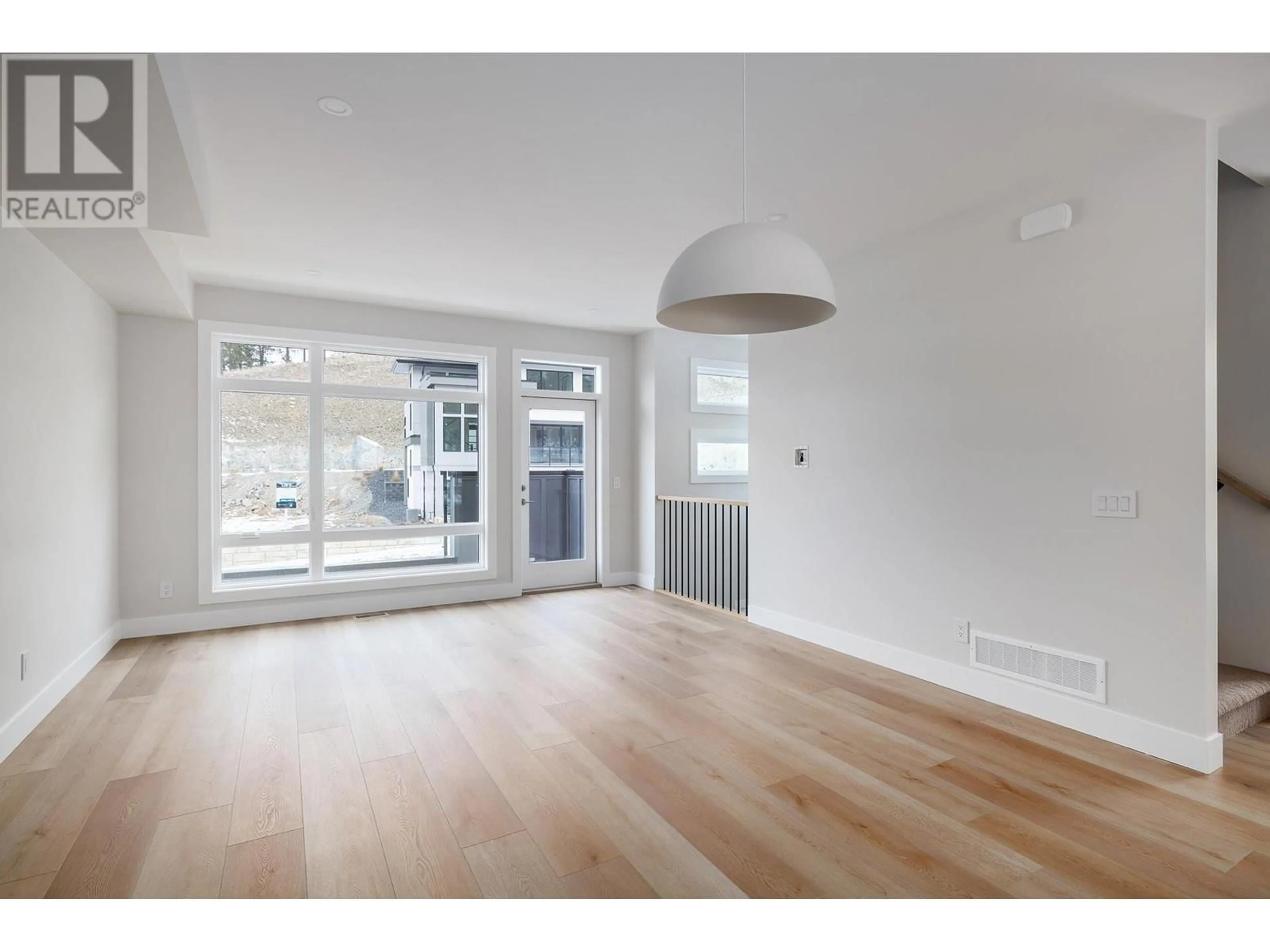 Living room with furniture, unknown for 1 - 3425 HILLTOWN DRIVE, Kelowna British Columbia V1V2B5