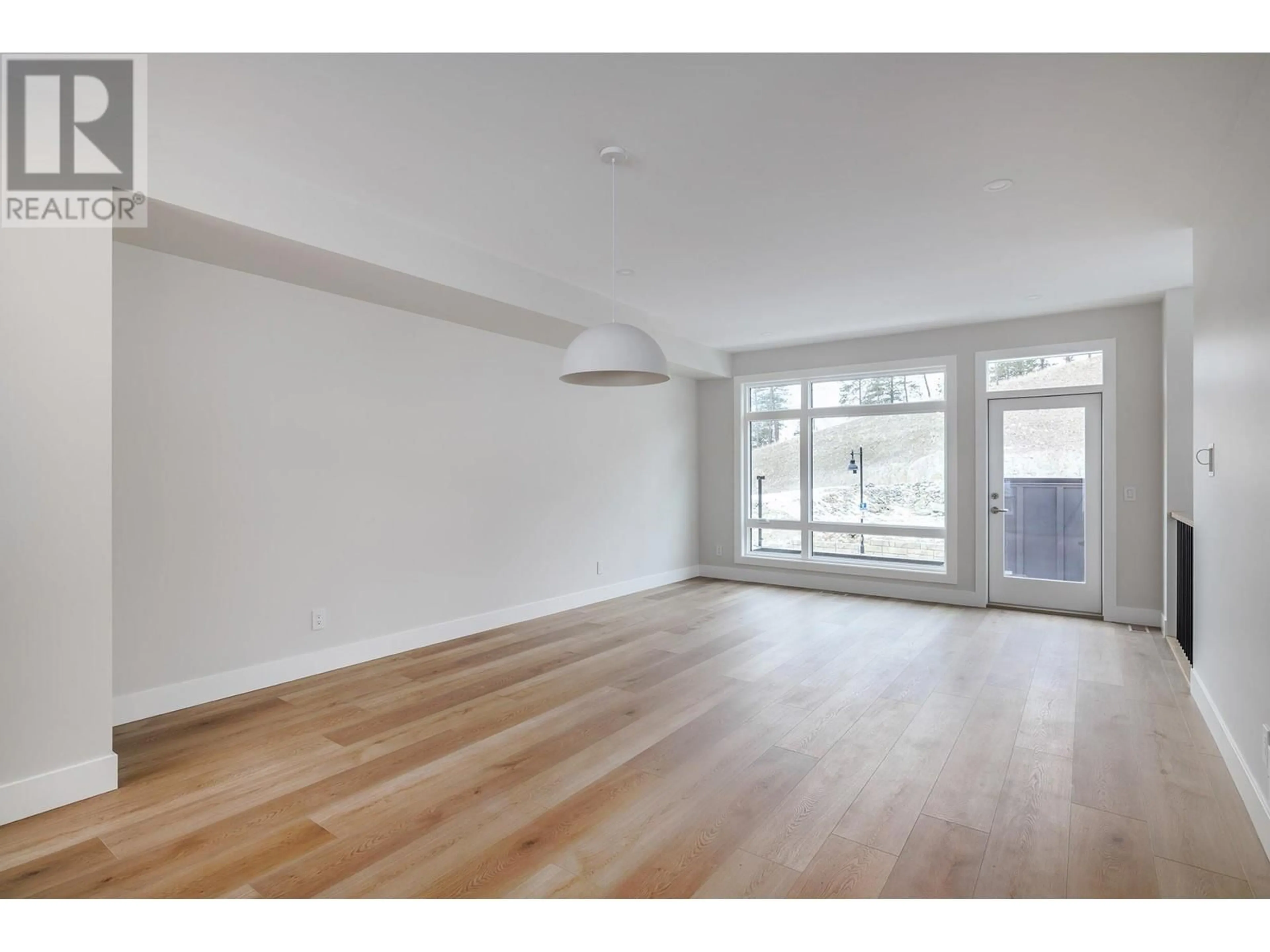 Living room with furniture, unknown for 1 - 3425 HILLTOWN DRIVE, Kelowna British Columbia V1V2B5