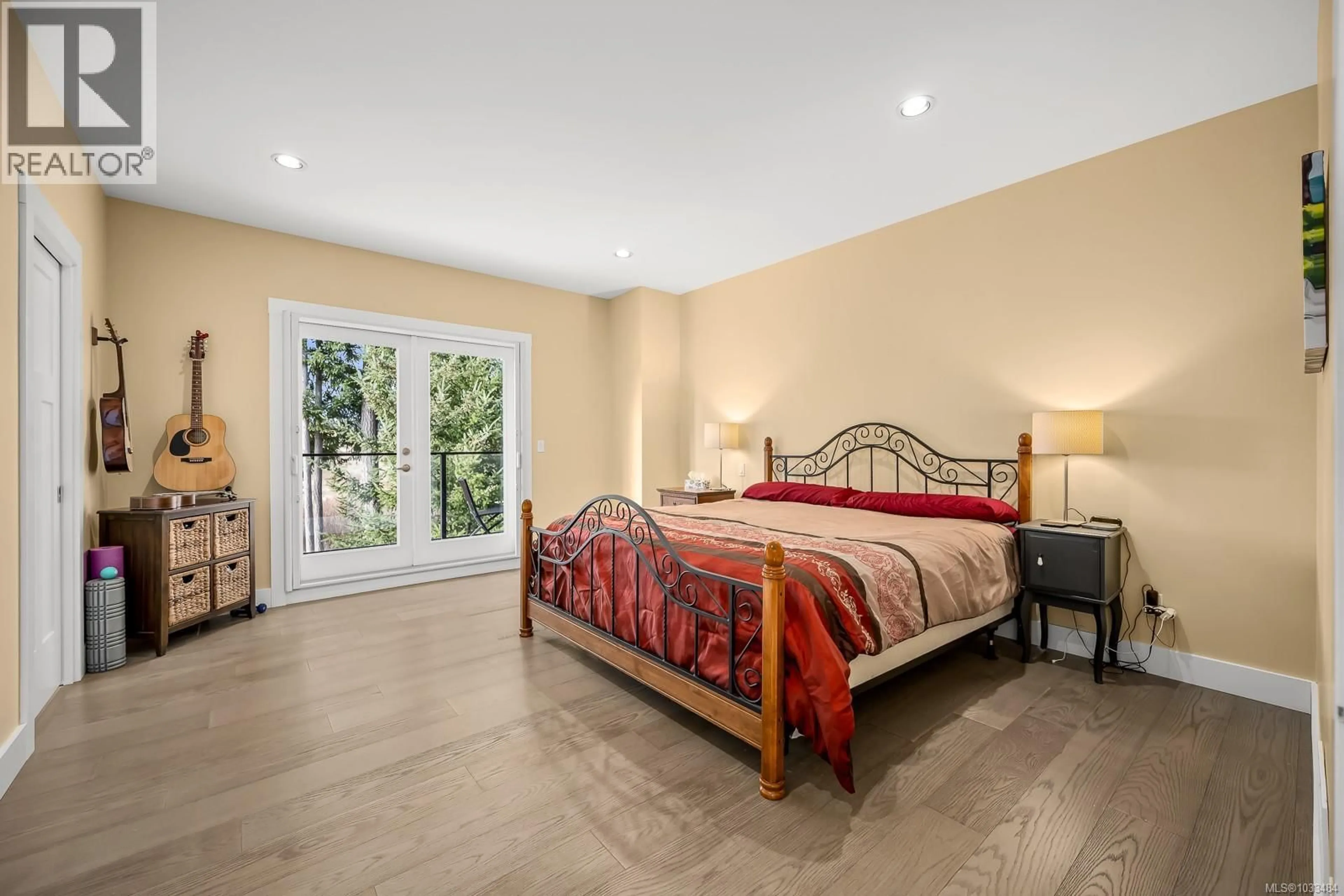 Bedroom with bed, ceramic/tile floor for 3389 RHYS ROAD, Courtenay British Columbia V9N0B7