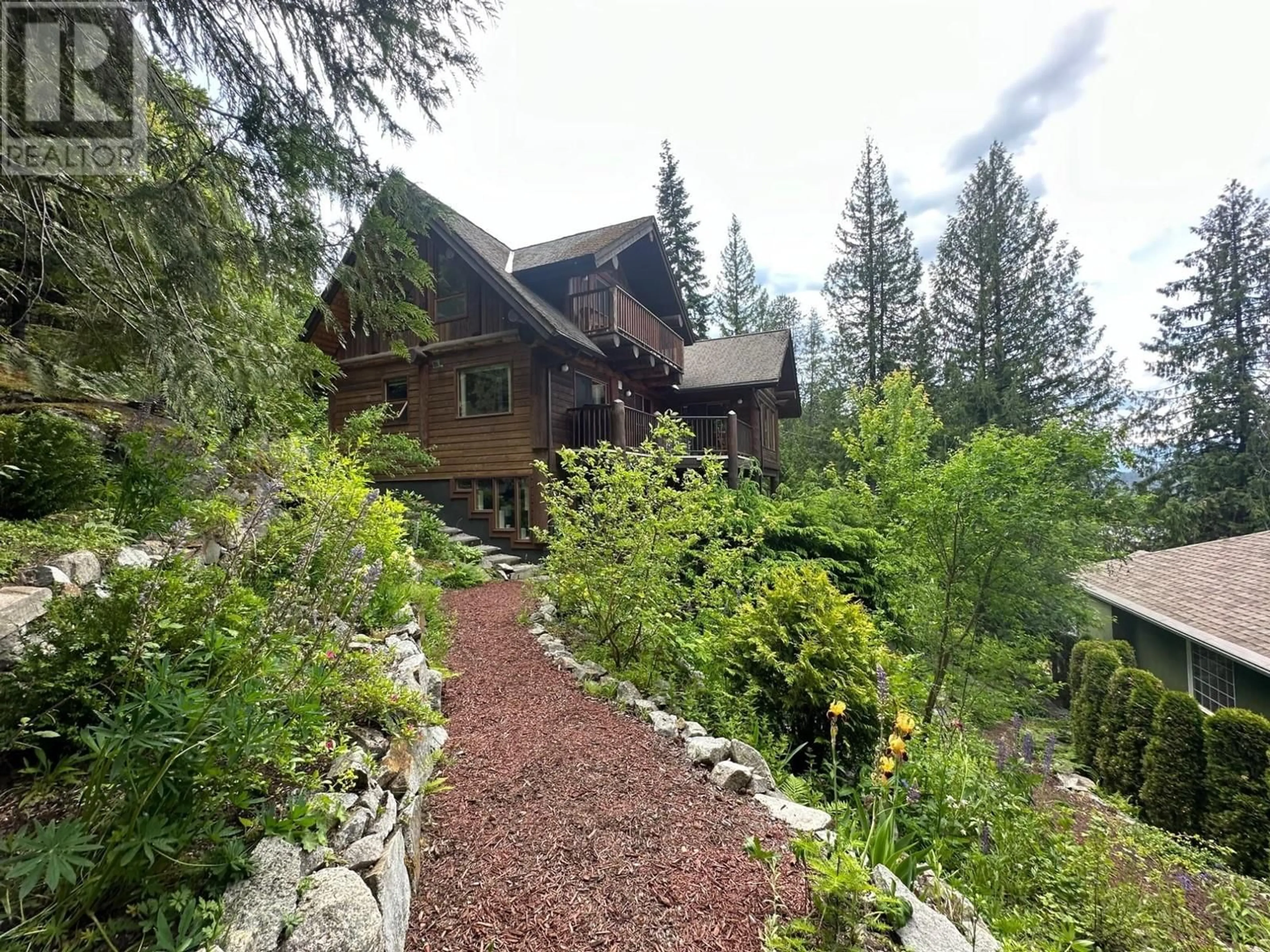 A pic from outside/outdoor area/front of a property/back of a property/a pic from drone, forest/trees view for 714 REGENT Street, Nelson British Columbia V1L6E5