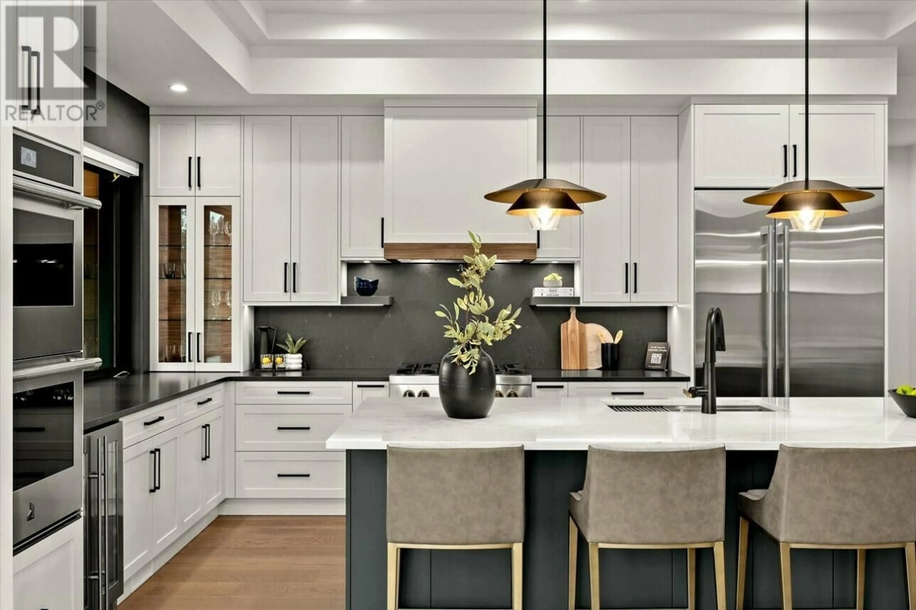 Contemporary kitchen, ceramic/tile floor for 124 WILDSONG CRESCENT WEST, Vernon British Columbia V1H0A8