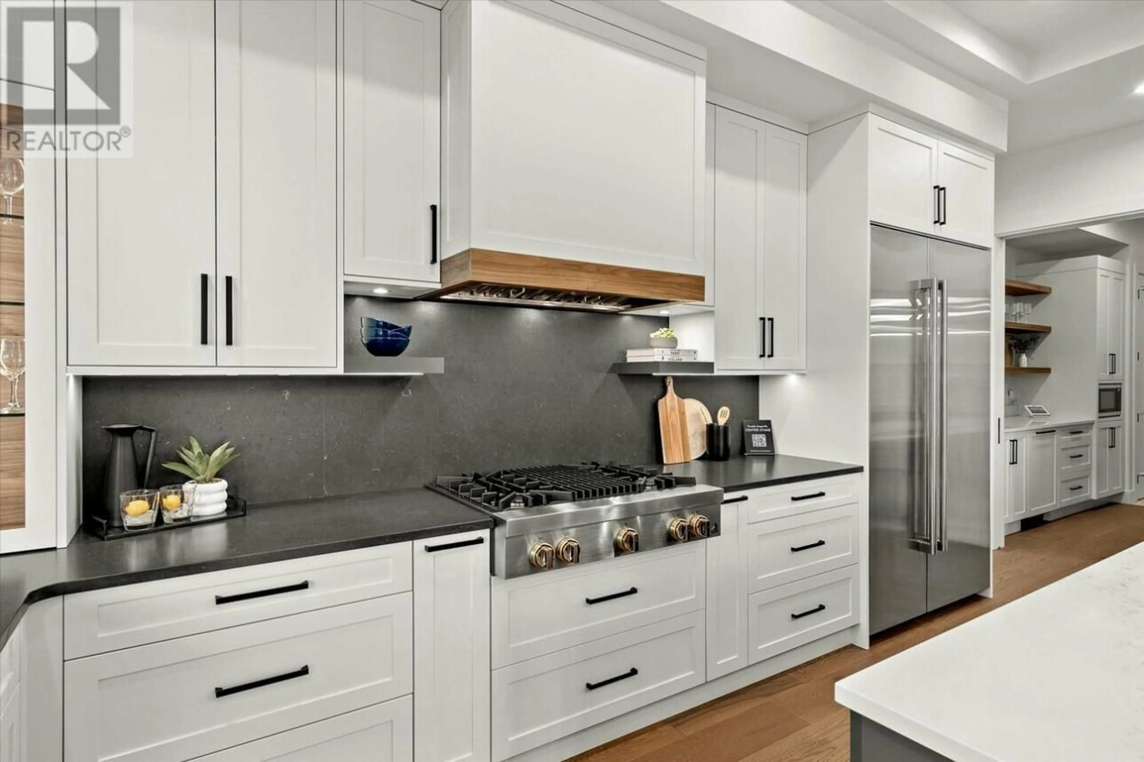Contemporary kitchen, ceramic/tile floor for 124 WILDSONG CRESCENT WEST, Vernon British Columbia V1H0A8