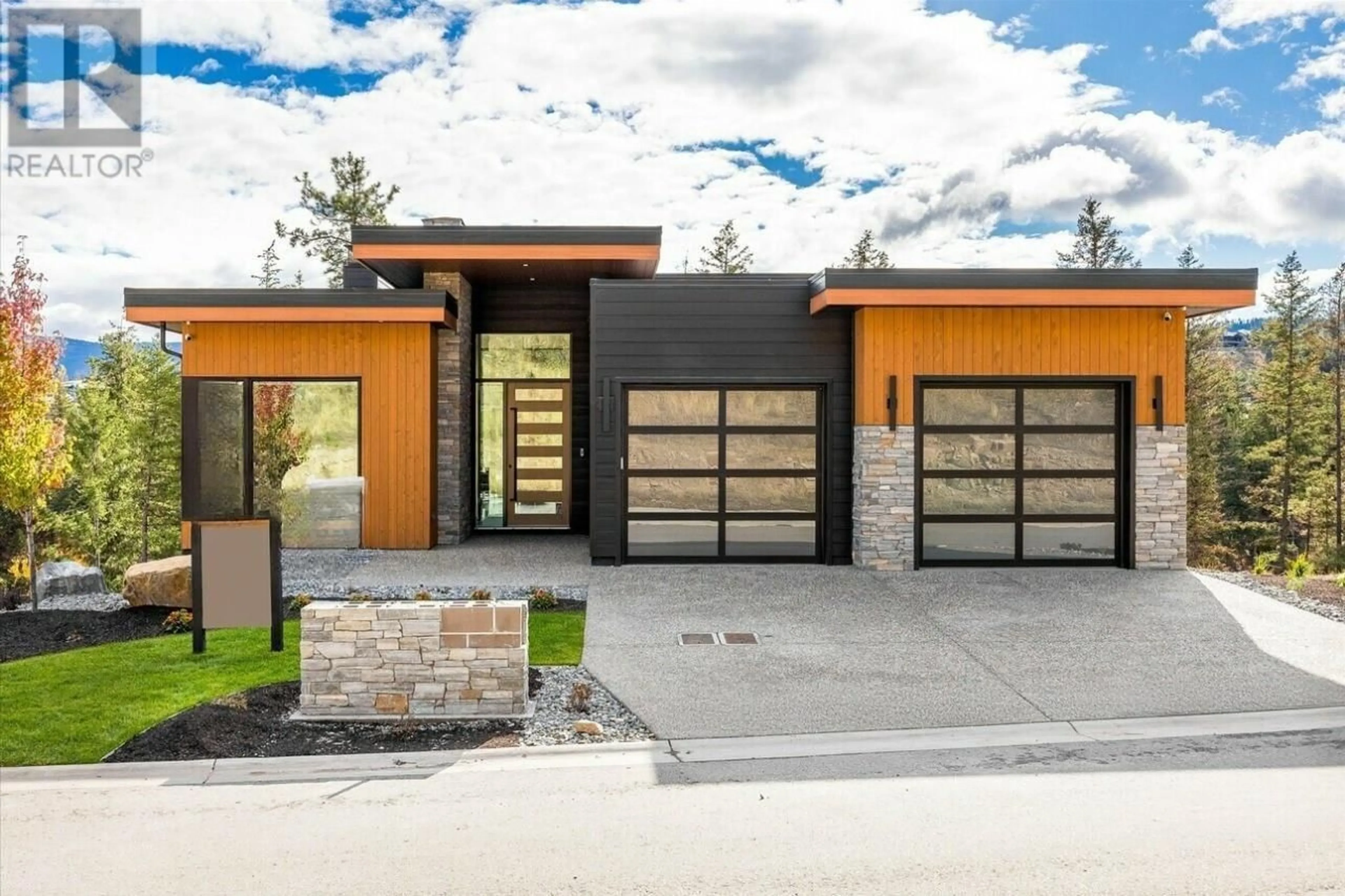 Home with brick exterior material, street for 124 Wildsong Crescent W, Vernon British Columbia V1H0A8