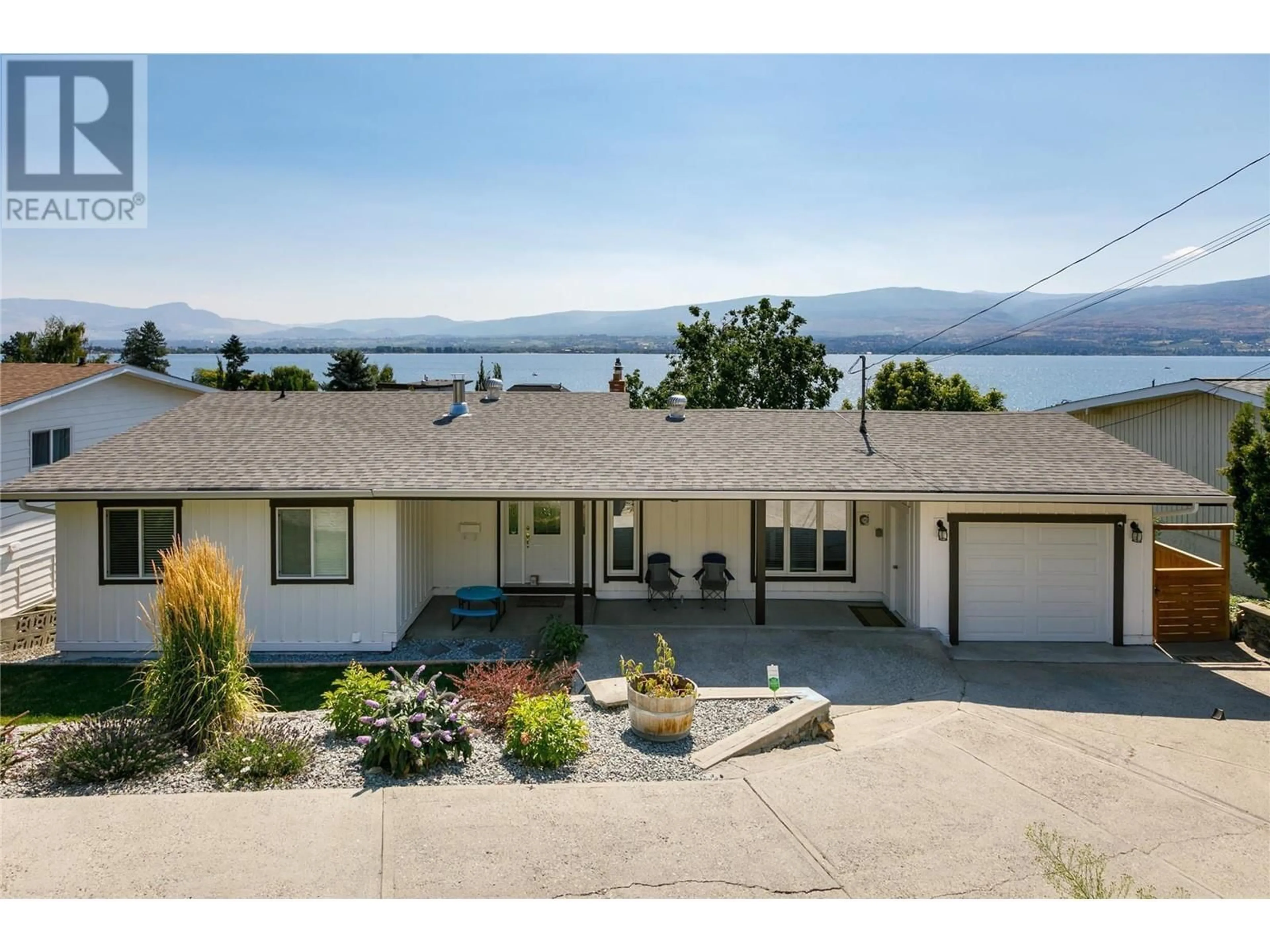 A pic from outside/outdoor area/front of a property/back of a property/a pic from drone, water/lake/river/ocean view for 2751 Benedick Road, Kelowna British Columbia V1Z1V1