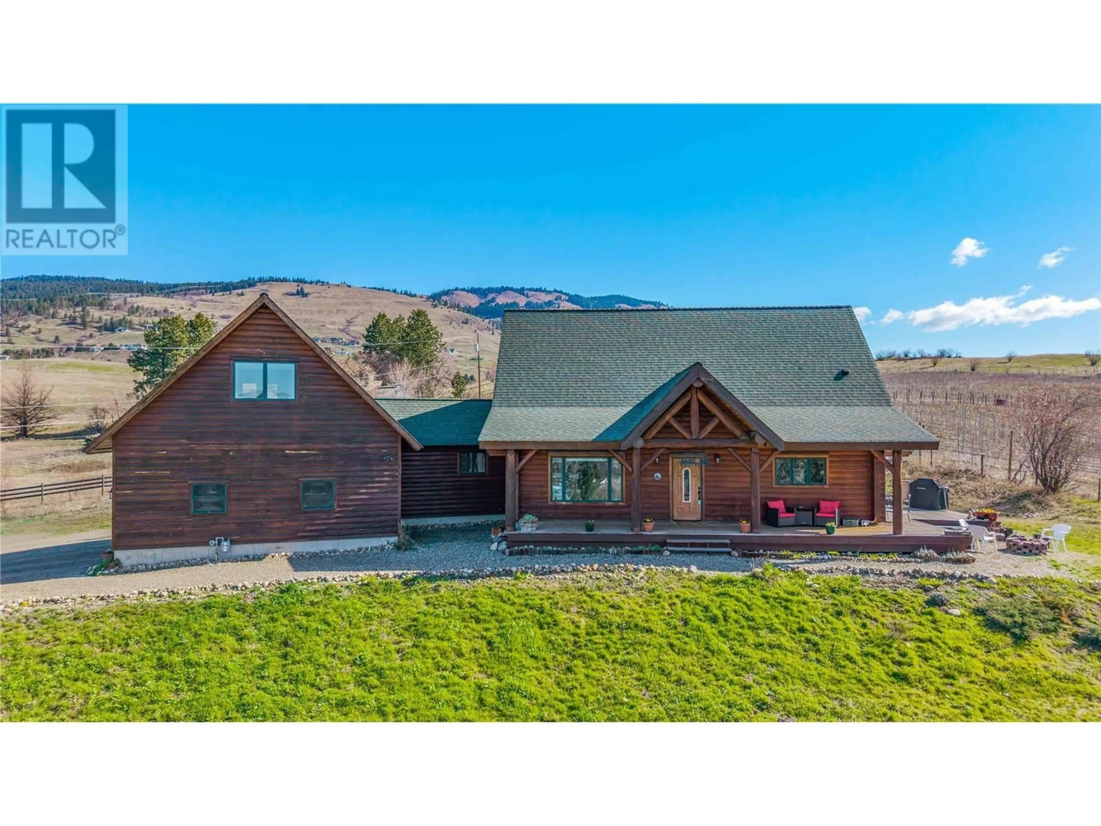 A pic from outside/outdoor area/front of a property/back of a property/a pic from drone, mountain view for 9371 6 HIGHWAY, Coldstream British Columbia V1B3B5