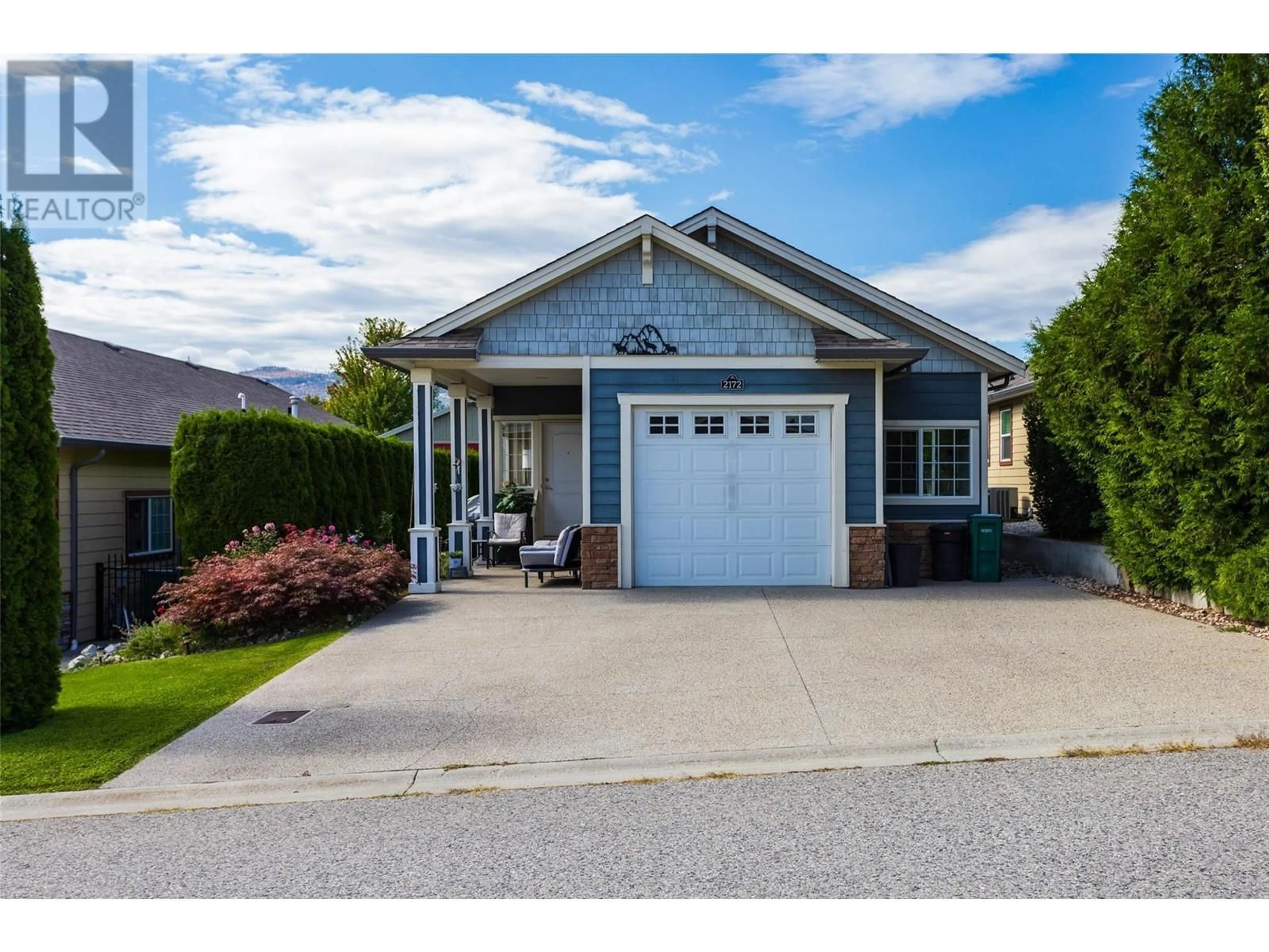 Home with vinyl exterior material, street for 2172 MIMOSA DRIVE, Westbank British Columbia V4T3A5