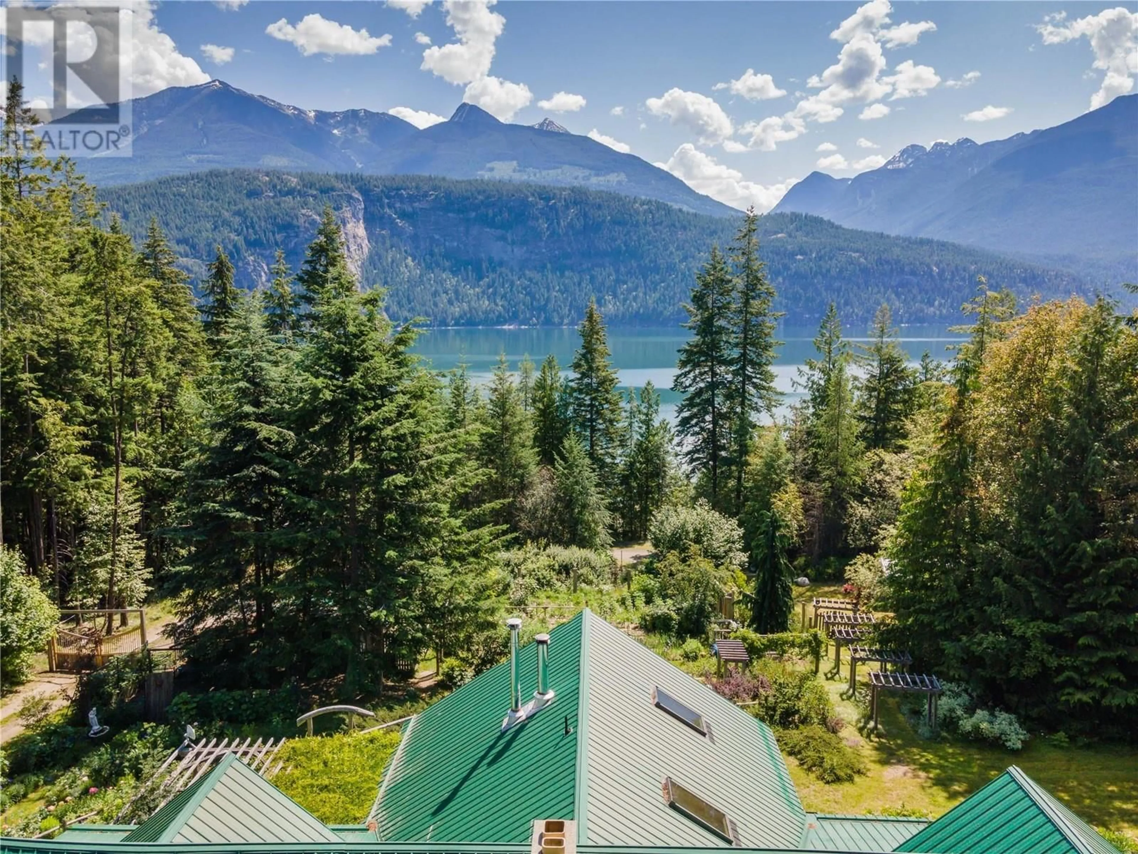 A pic from outside/outdoor area/front of a property/back of a property/a pic from drone, water/lake/river/ocean view for 9323 Shutty Bench Road, Kaslo British Columbia V0G1M0