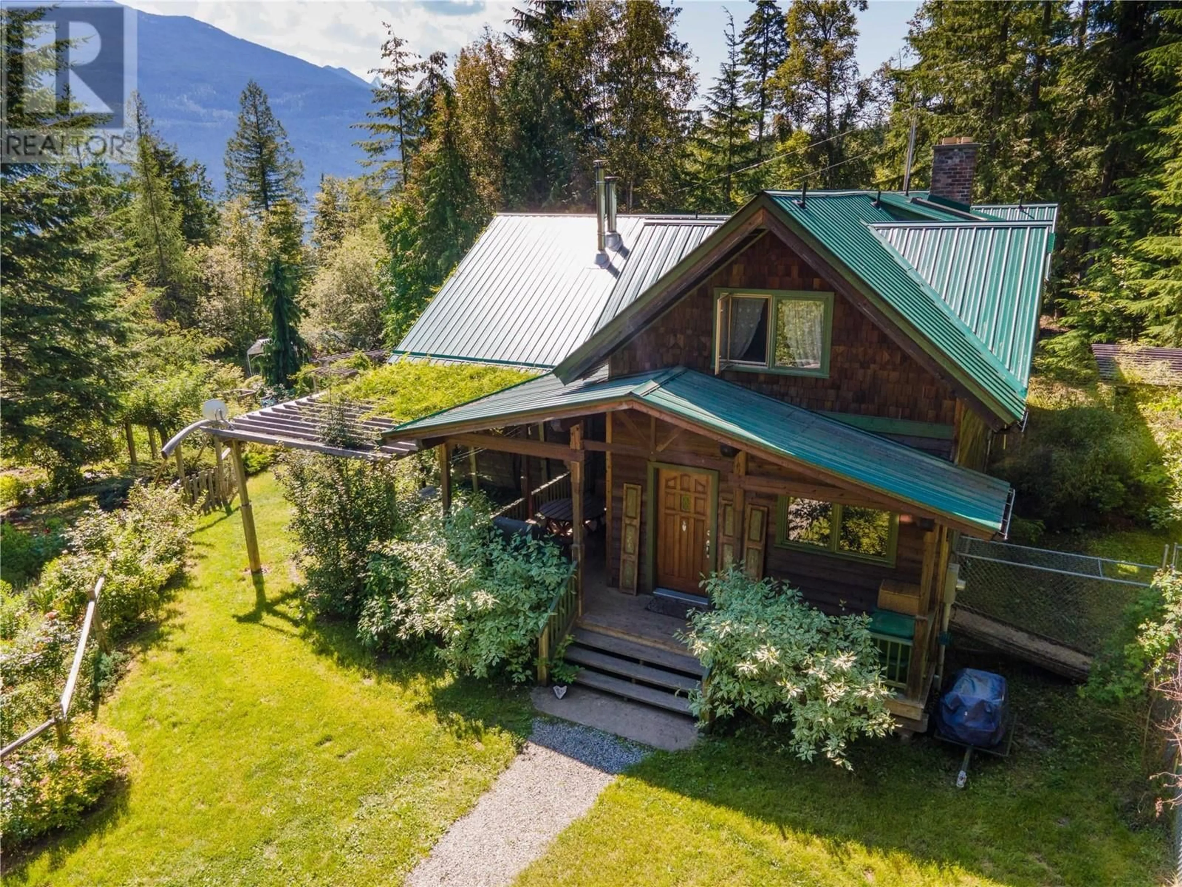 A pic from outside/outdoor area/front of a property/back of a property/a pic from drone, mountain view for 9323 Shutty Bench Road, Kaslo British Columbia V0G1M0